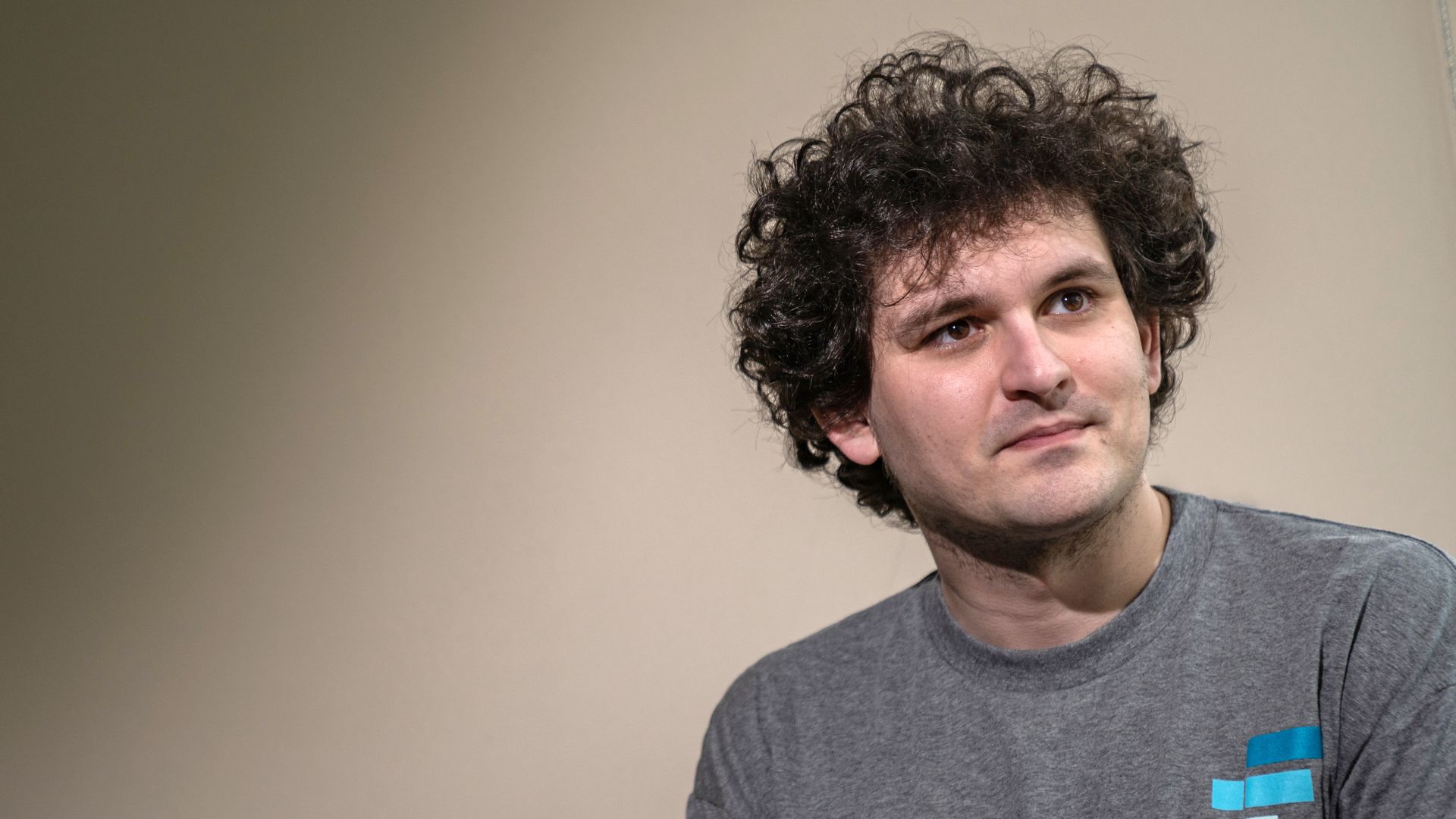Sam Bankman Fried, CEO of crypto derivatives exchange FTX, looks out of the lens frame