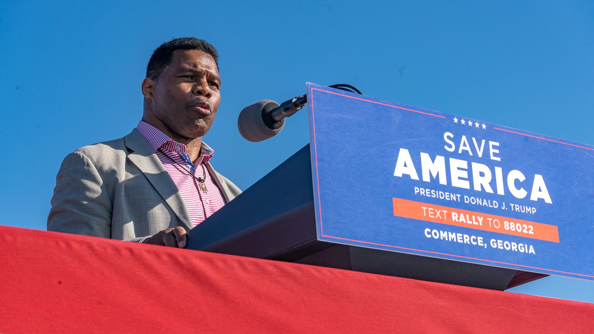 Heisman Trophy winner and Republican candidate for US Senate Herschel Walker speaks to supporters of former U.S. President Donald Trump.