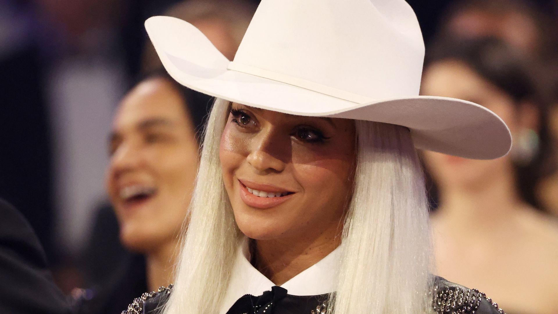 Beyonce wearing a cowboy hat.
