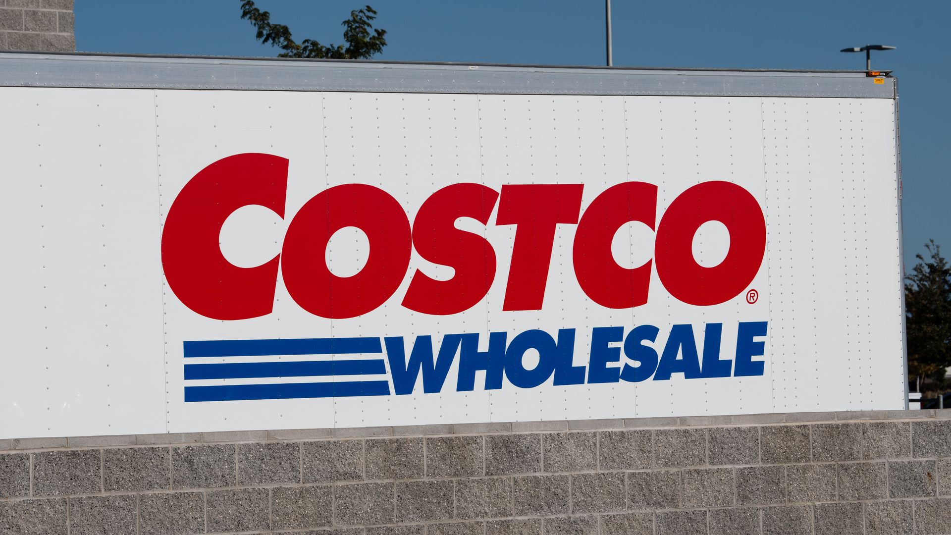 The corporate logo of Costco Wholesale is seen printed on the side of a distribution logistics trailer in Saratoga Springs, Utah, United States, on September 8, 2026. 