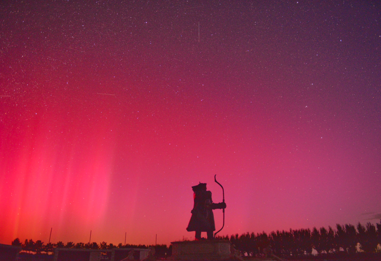 The northern lights illuminate the sky over the Jinshanling Great Wall in Daqing, Heilongjiang province of China, on Oct. 11. 