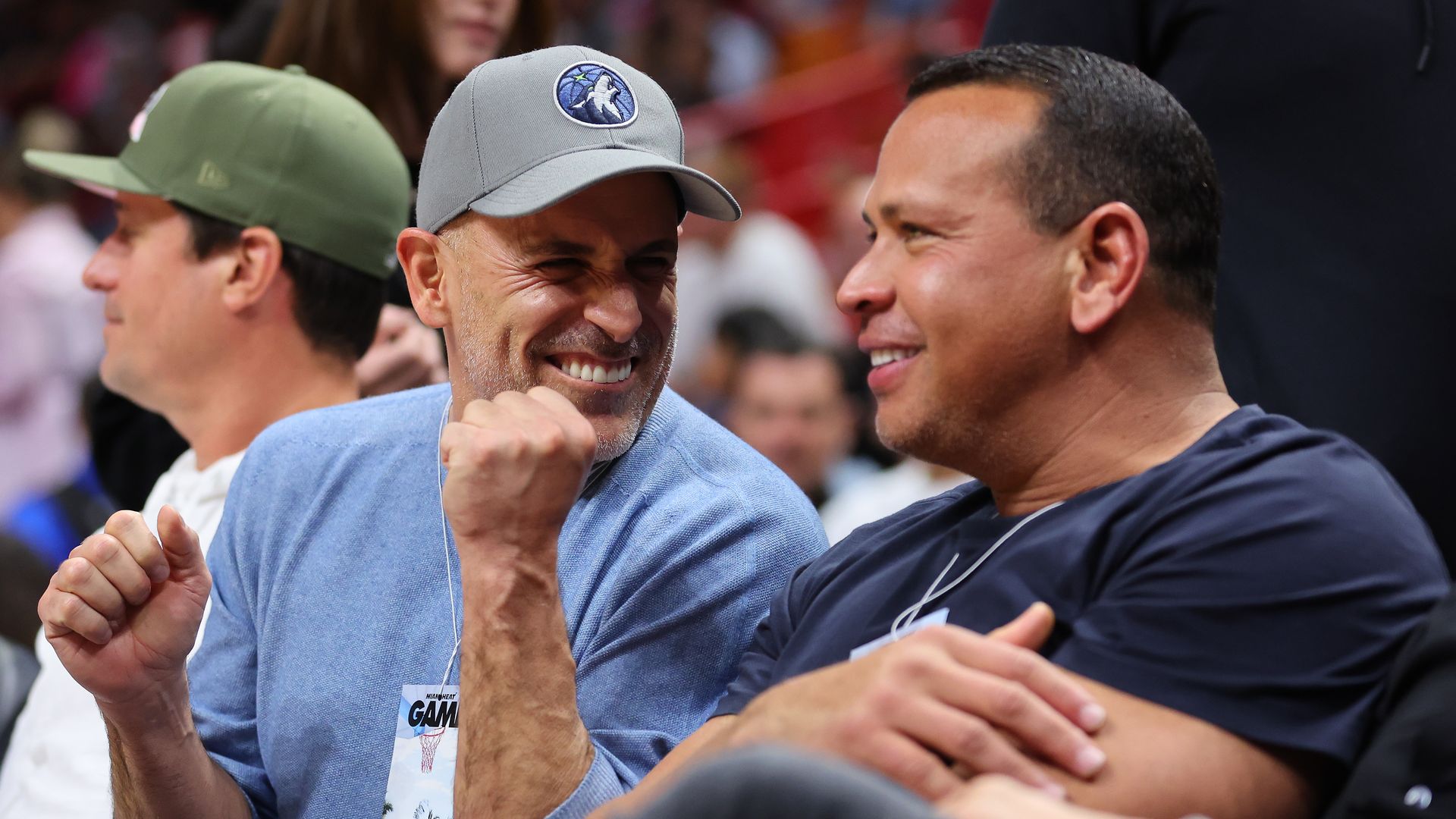 Owners Marc Lore and Alex Rodriguez of the Minnesota Timberwolves fist bump after the Minnesota Timberwolves defeated the Miami Heat at FTX Arena on March 12, 2022 in Miami, Florida. 