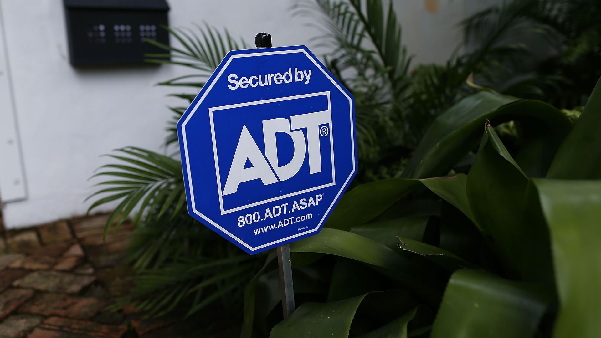 ADT security sign outside of a home.