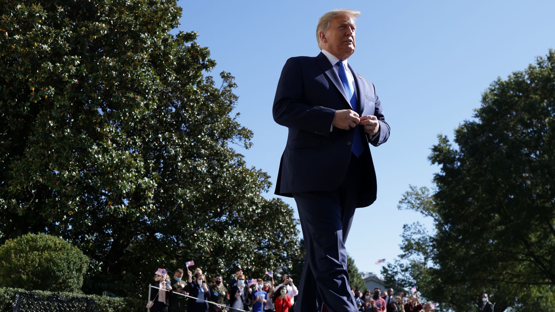 : U.S. President Donald Trump approaches members of the press prior to a Marine One departure from the White House