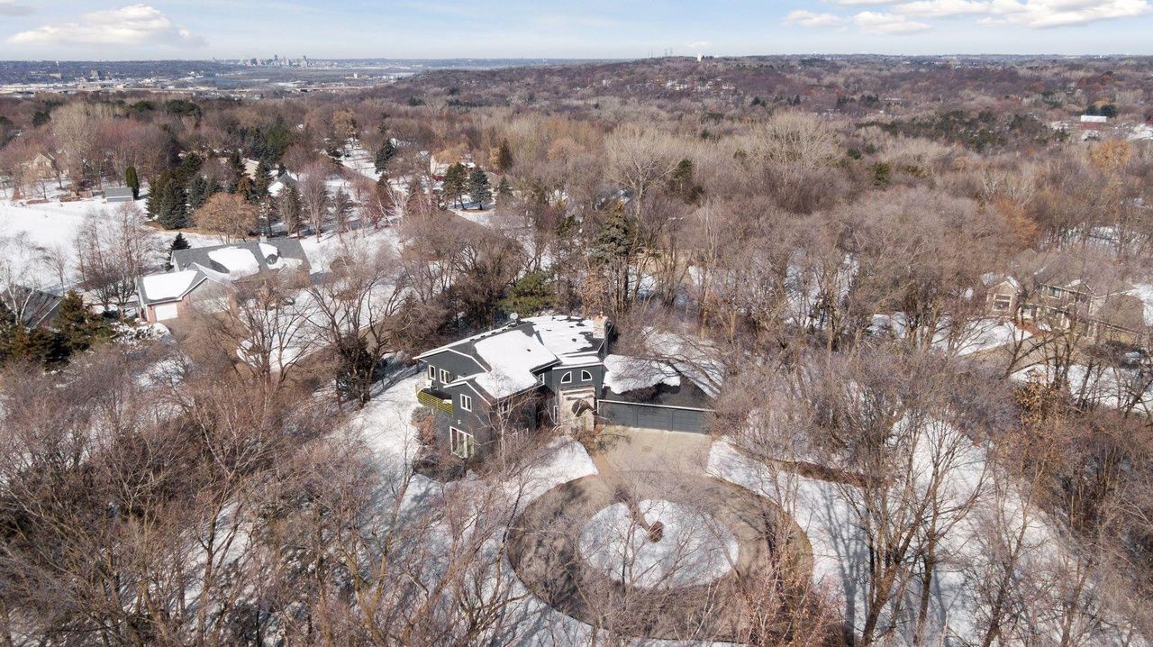 overhead view of property with circular driveway