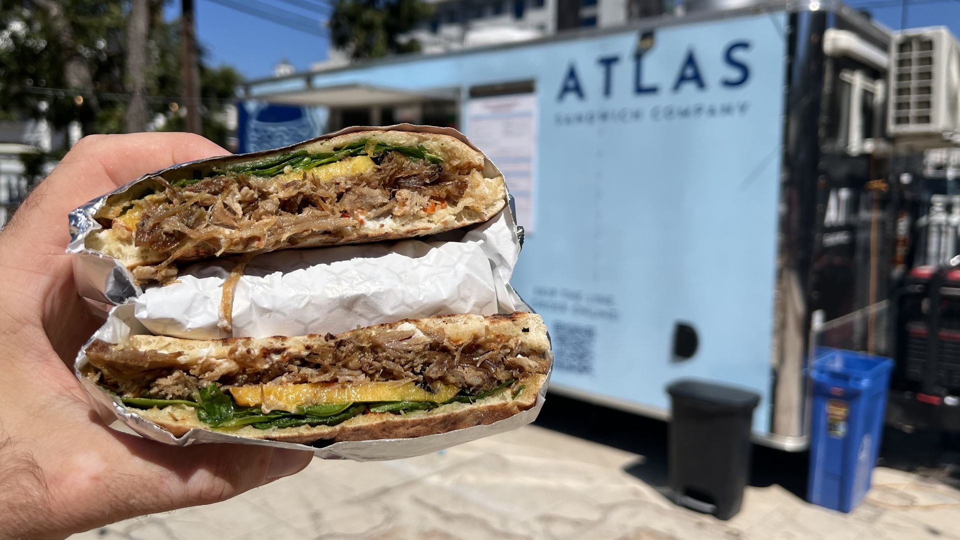 A sandwich full of slow-roasted lamb