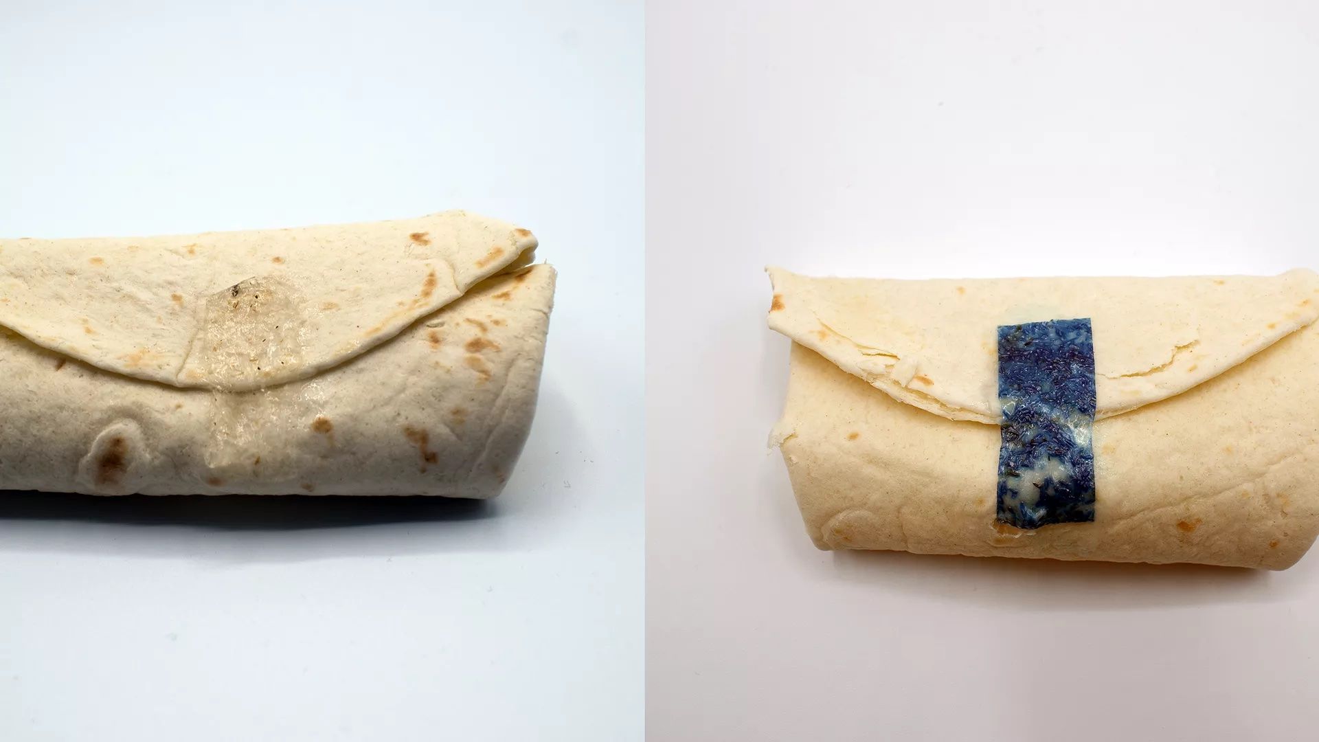 Two burritos being held together by edible 