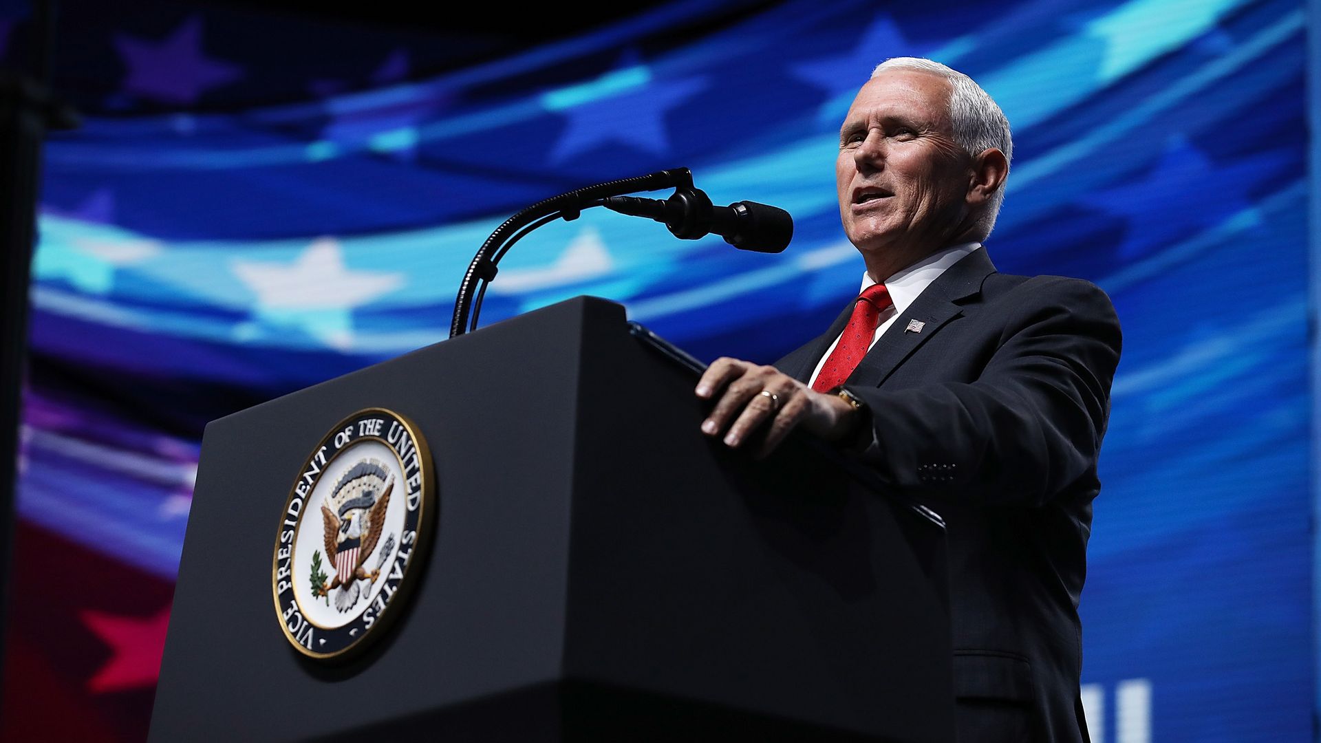 Mike Pence speaks at a podium