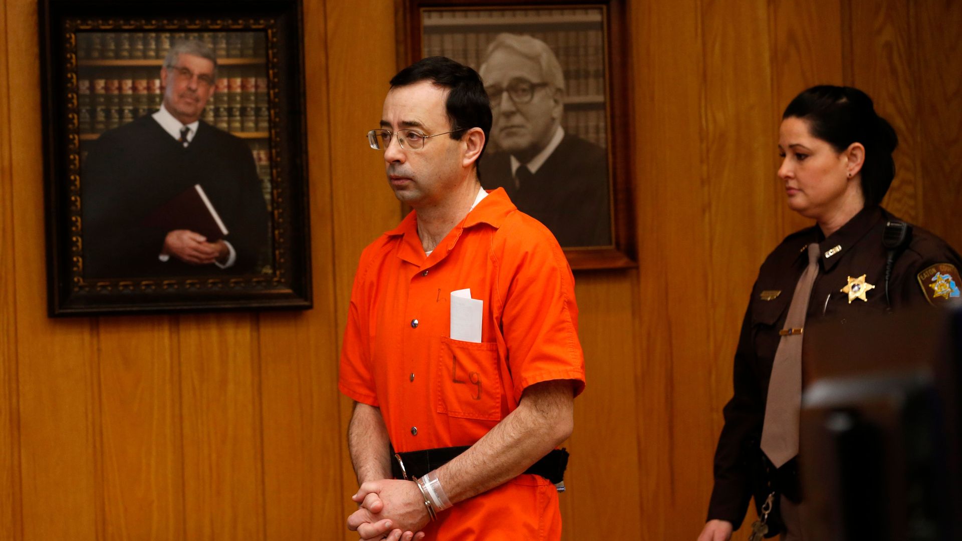 Larry Nassar enters the courtroom during the sentencing hearing in 2018
