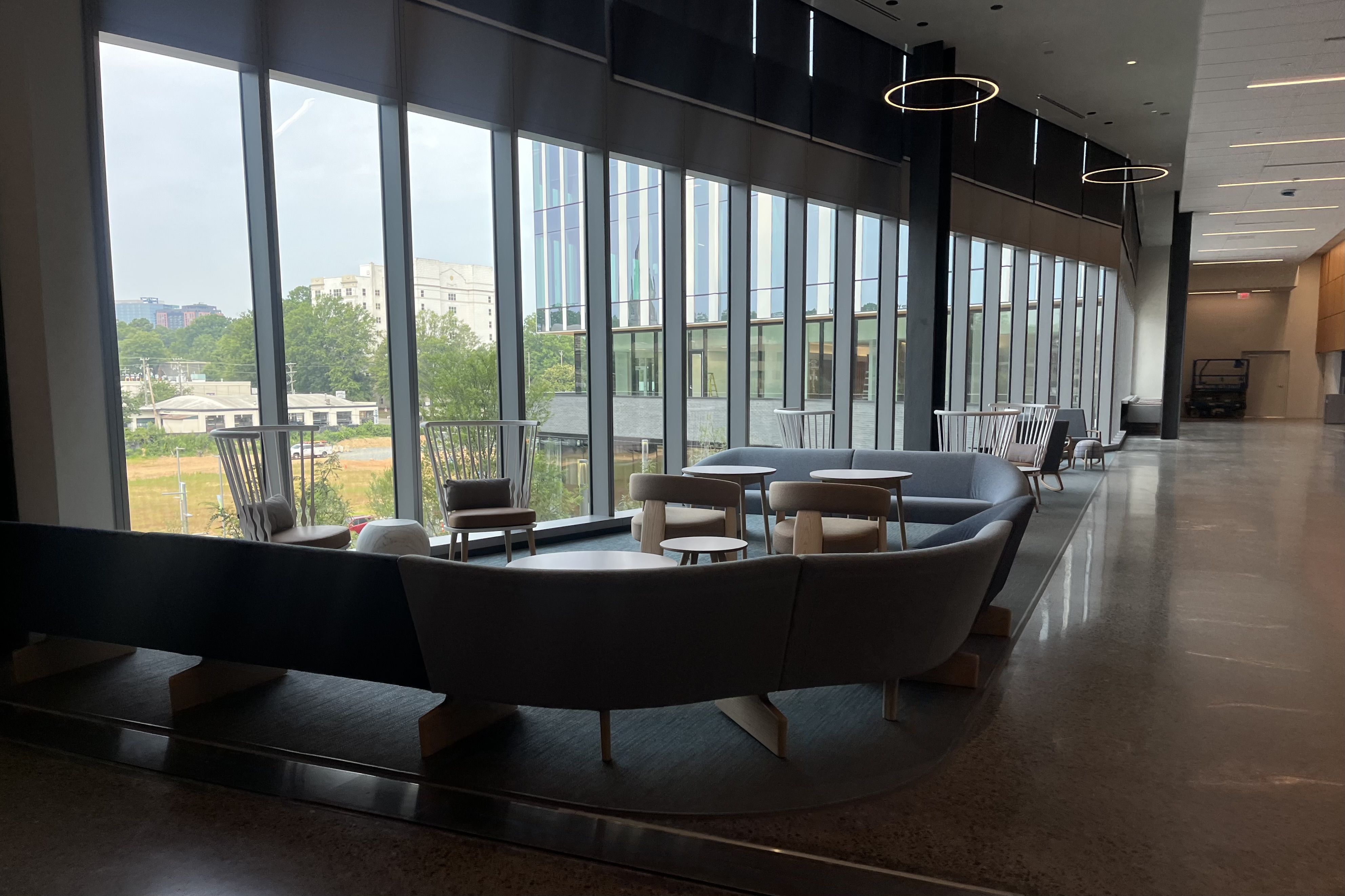 Chairs and tables in a corridor