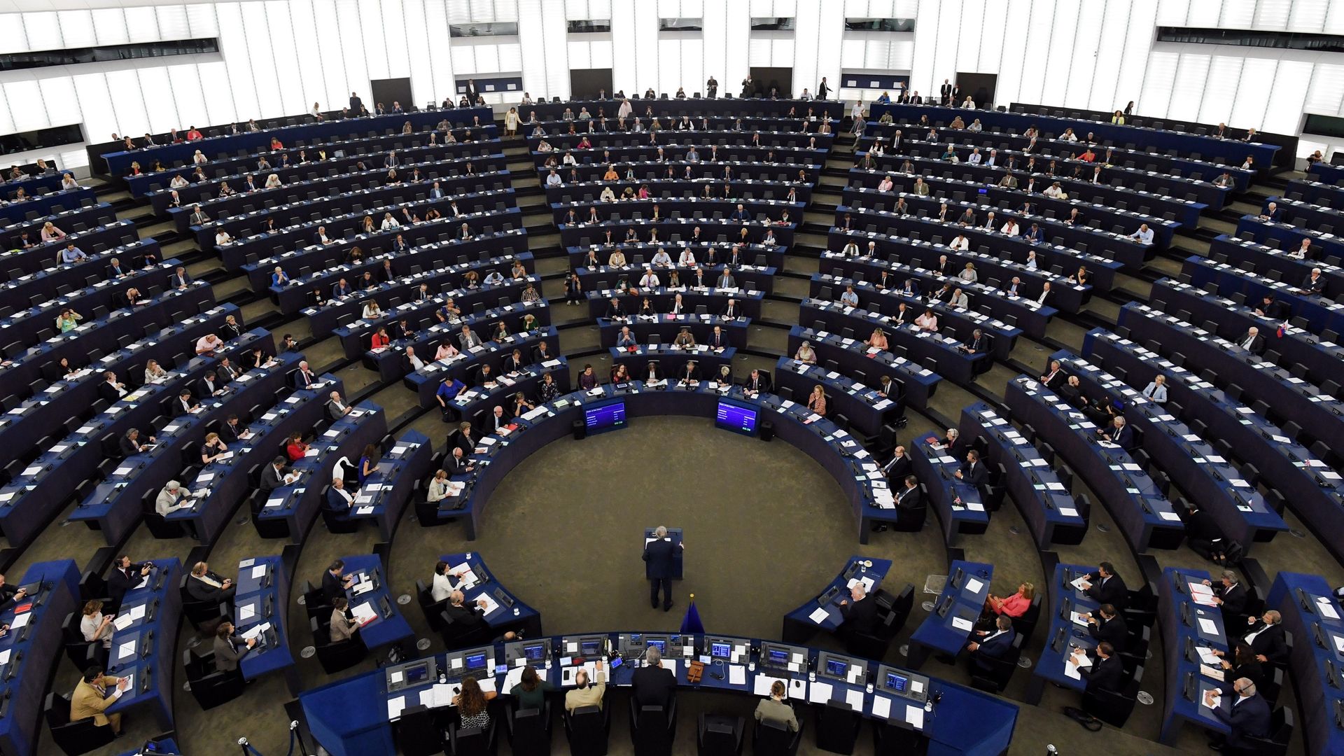 Rows of seats arranged in a circle at the European Parliament