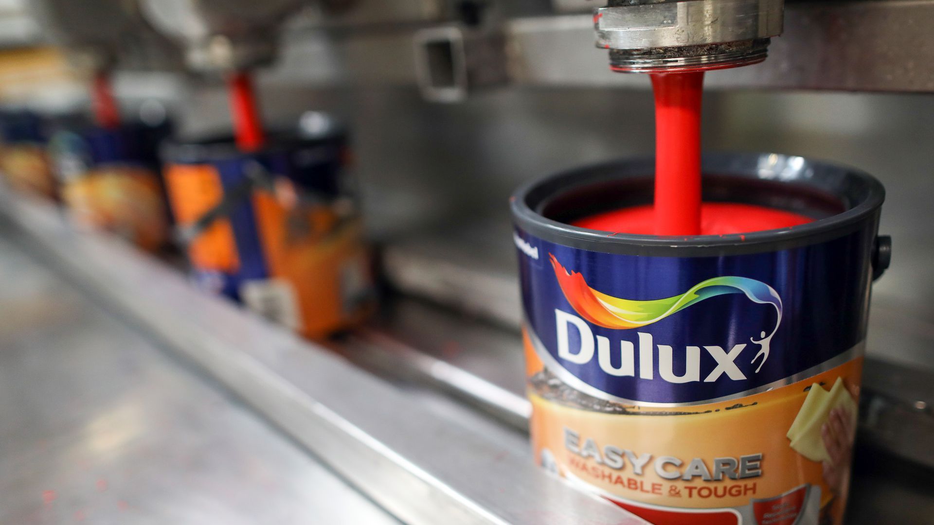 Illustration of paint flowing into a can.