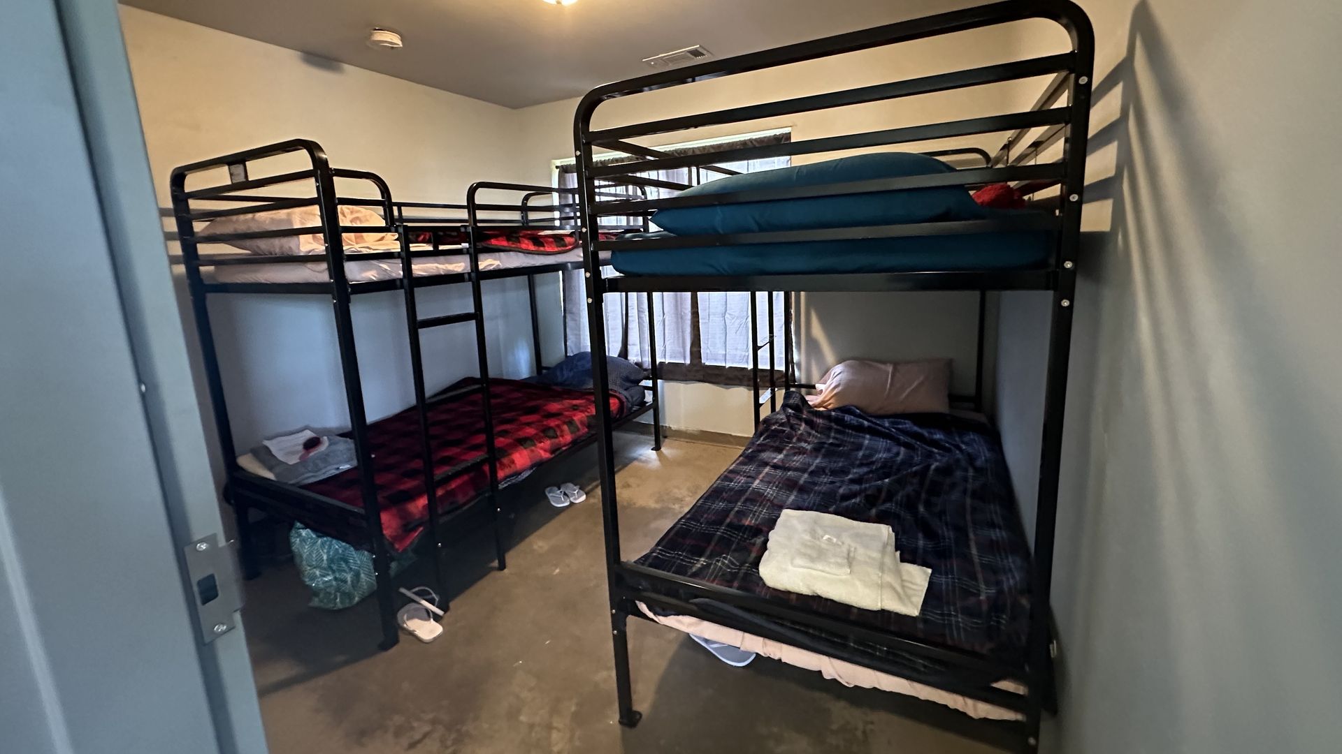 photo of beds inside homeless shelter