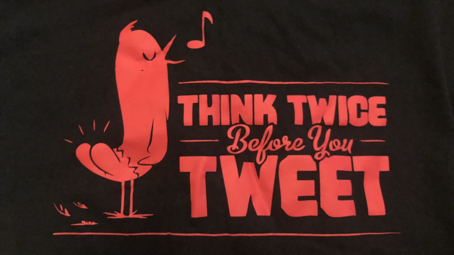 T-Shirt that says "Think twice before you tweet"