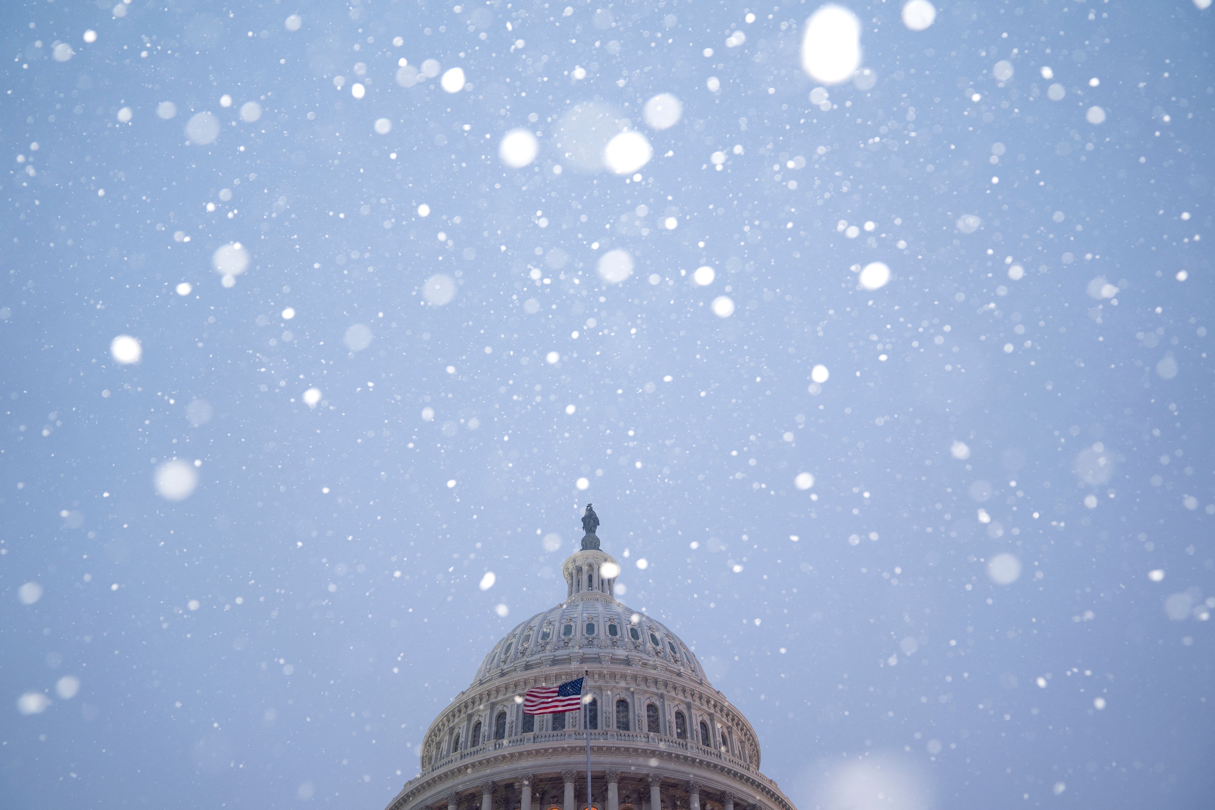 The U.S. Capitol dome during a snowstorm on Jan. 16. 