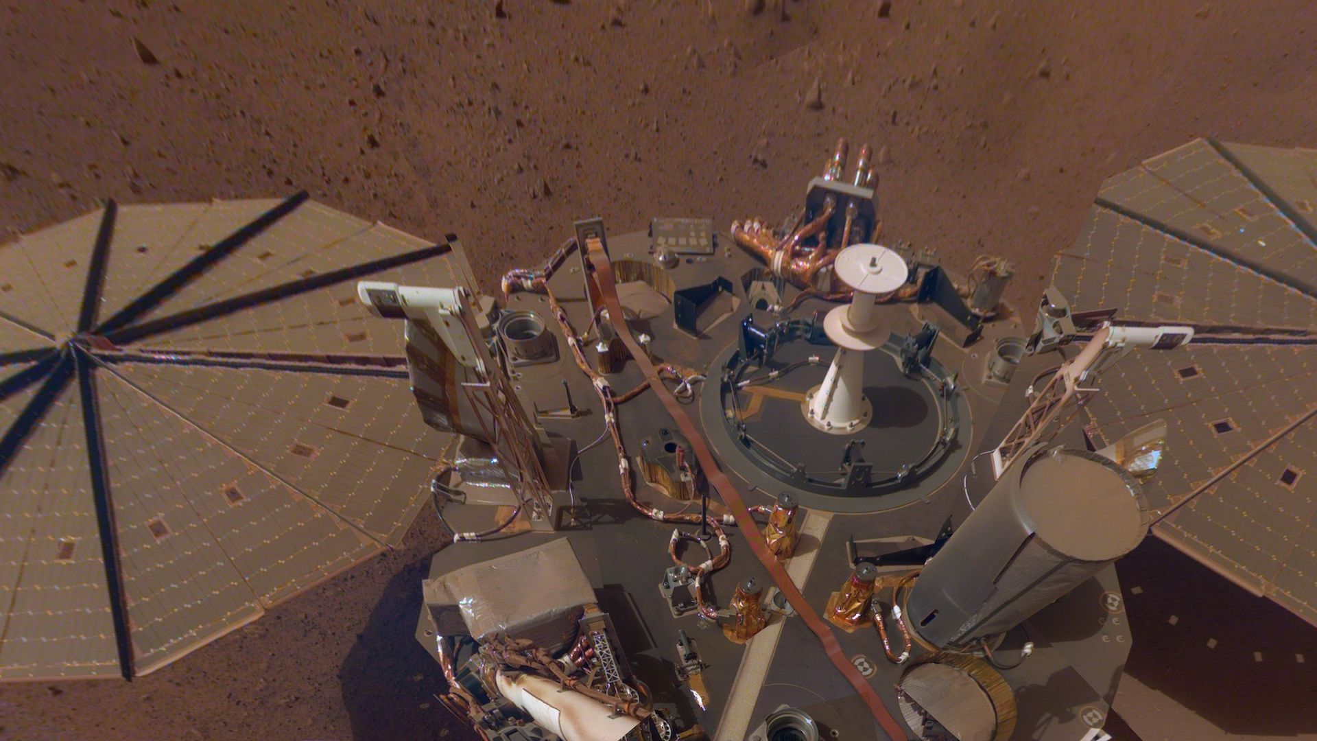 NASA's InSight lander on Mars bathed in red dust