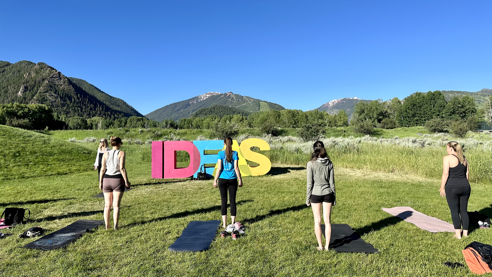 A daily morning yoga class at the Aspen Ideas Festival in Aspen, Colorado. Photo: John Frank/Axios