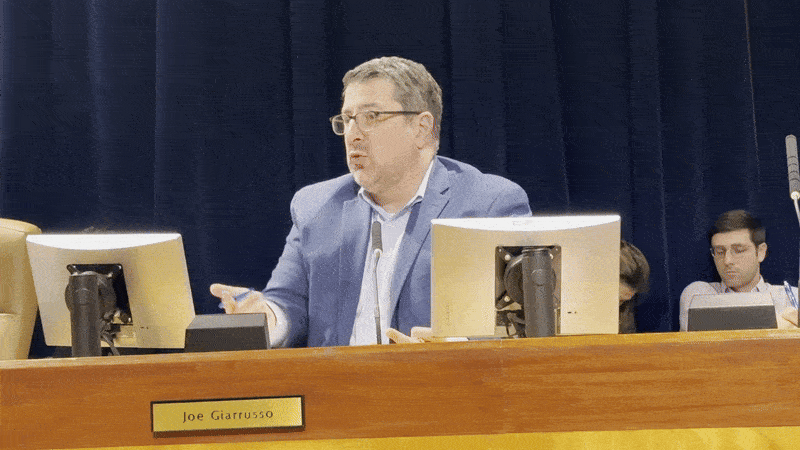 Image shows Joe Giarrusso talking and gesturing.