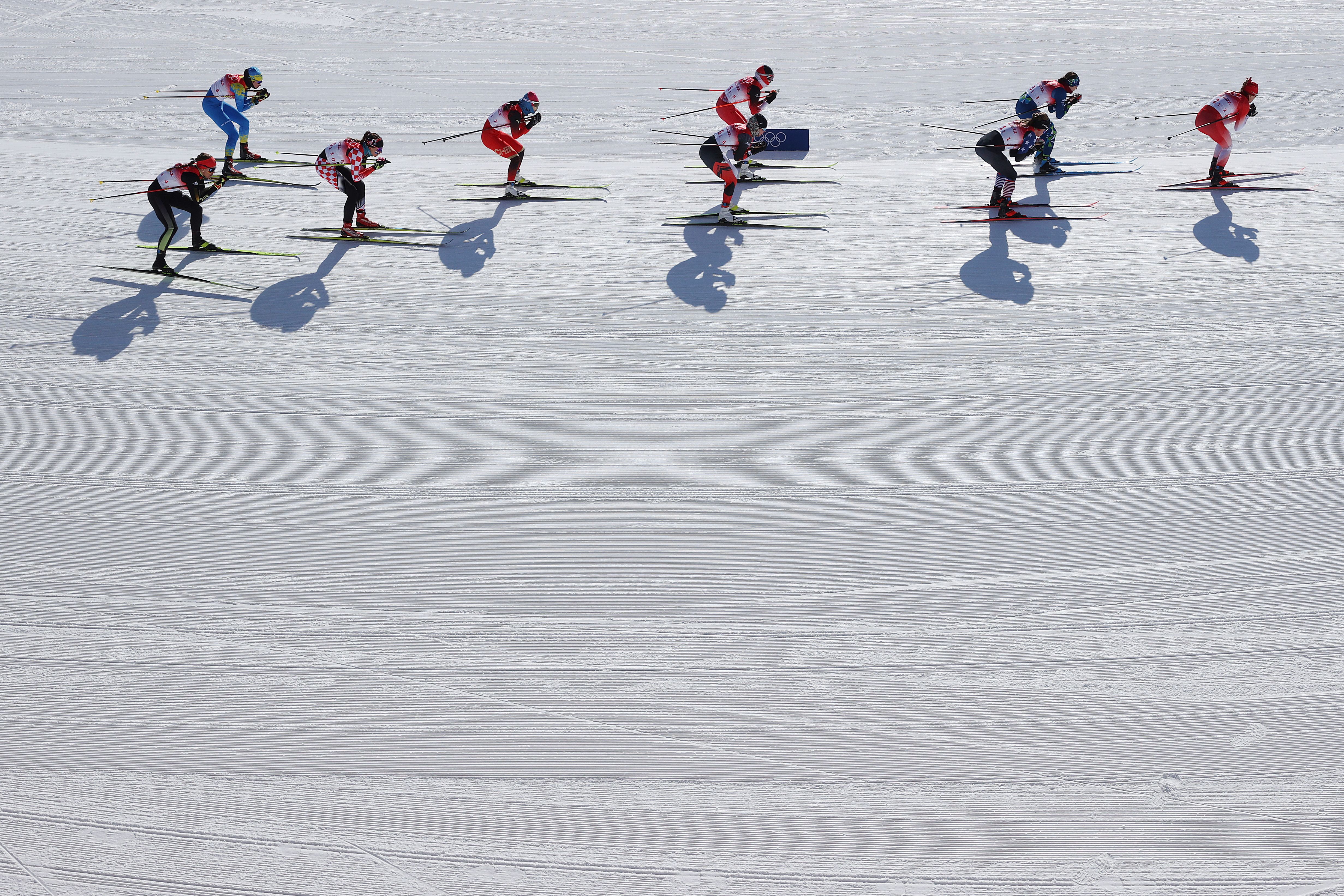 Athletes compete during the Women's Cross-Country Team Sprint Classic Semifinals at the Beijing 2022 Winter Olympics at The National Cross-Country Skiing Centre on February 16.