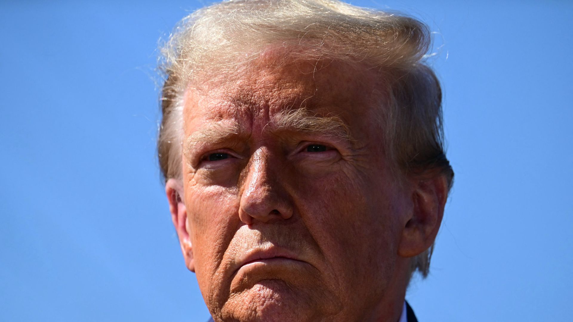Donald Trump looks out at the audience during a speech