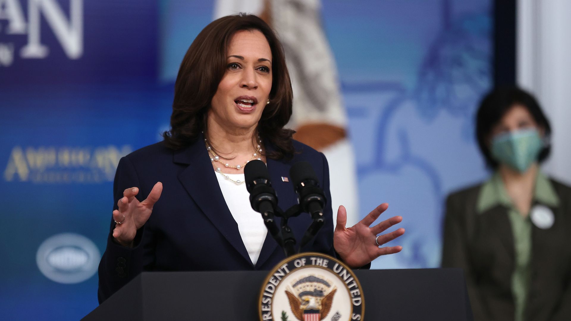 Picture of Kamala Harris speaking behind a podium