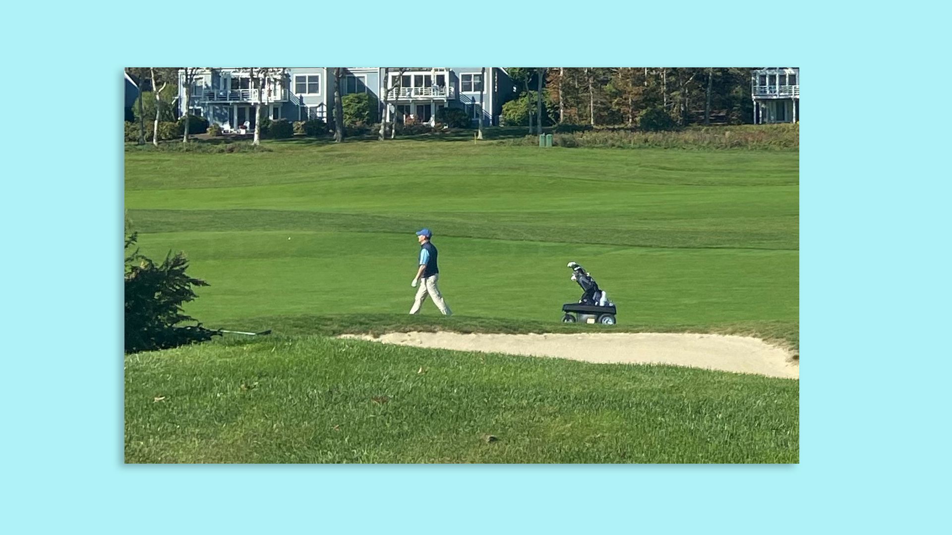 An autonomous golf cart on a golf course.