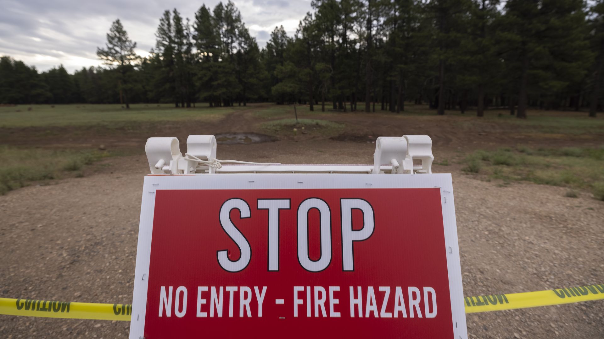 A sign that says, "Stop no entry fire hazard."