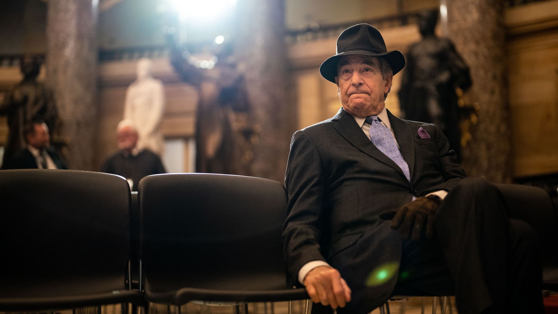 Paul Pelosi, husband of Speaker of the House Nancy Pelosi, sitting in the Capitol on Dec. 14.