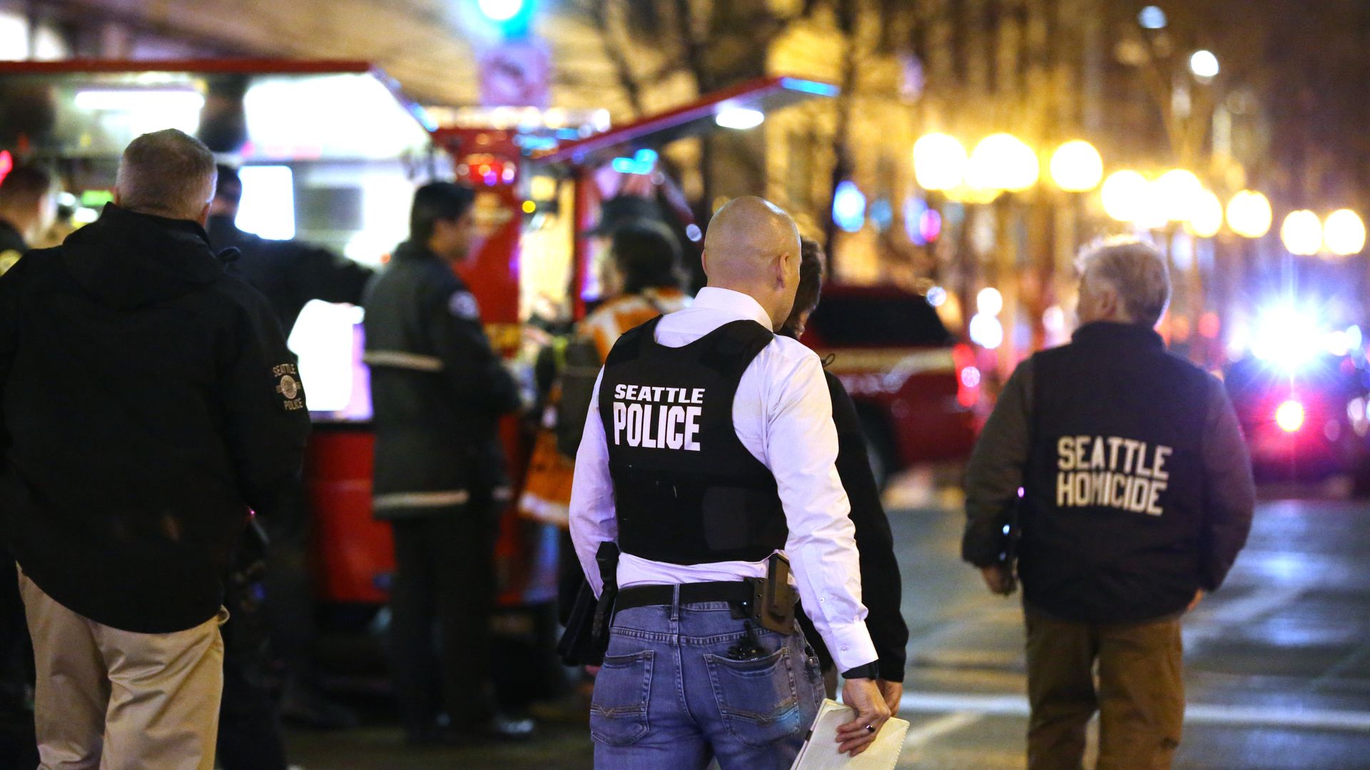 Police look over the scene of a deadly shooting at Seattle's 3rd Avenue and Pine Street on January 22, 2020