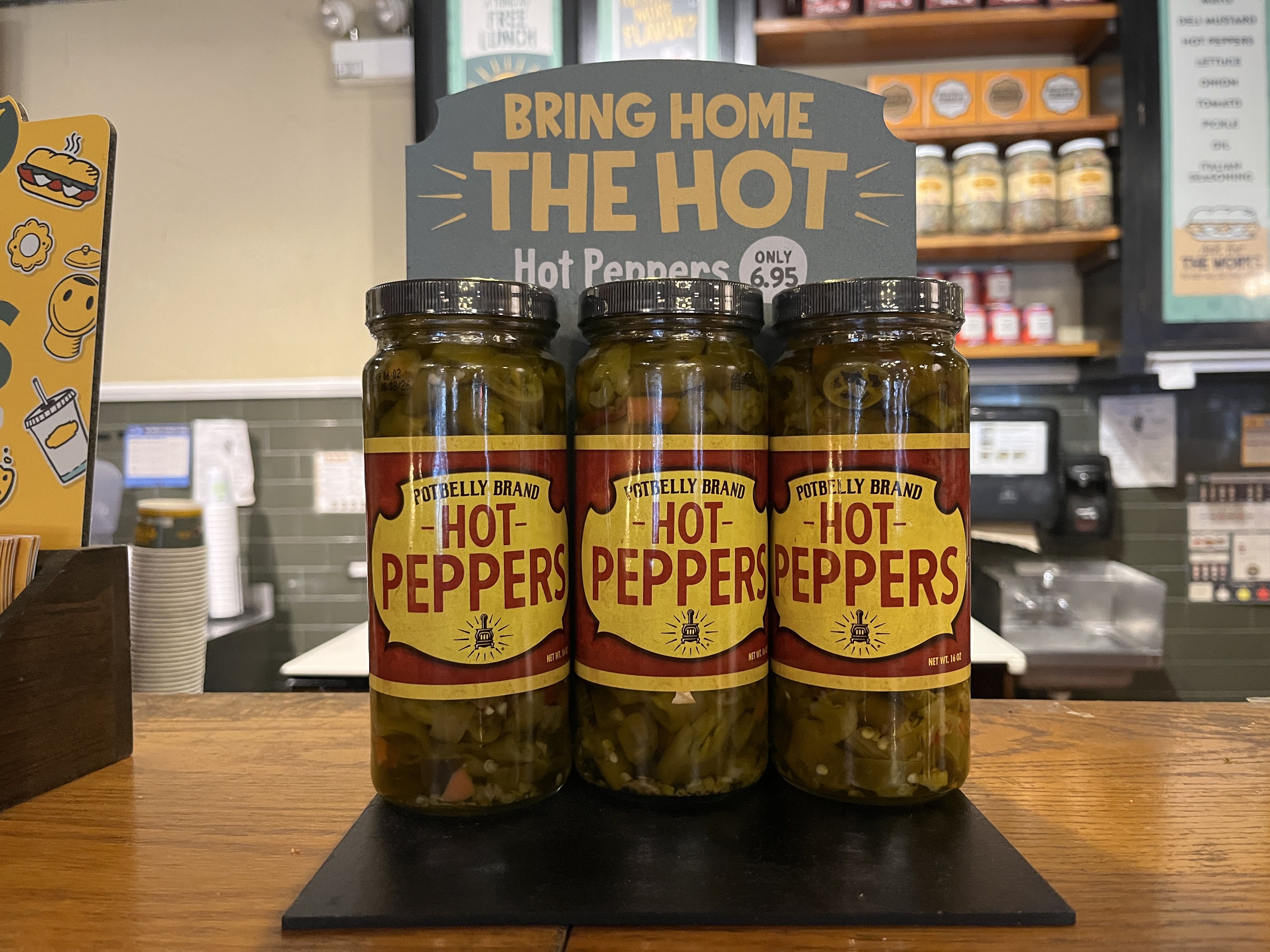 bottles of pickled peppes