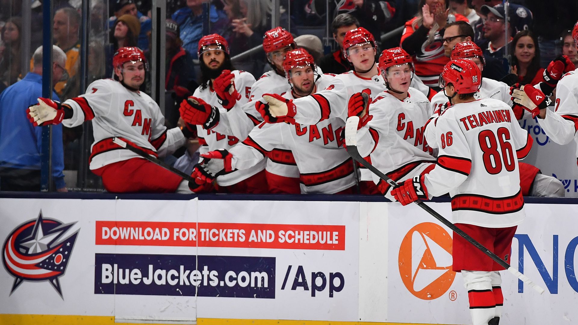 COLUMBUS, OHIO - APRIL 16: Teuvo Teravainen #86 of the Carolina Hurricanes high-fives his teammates after scoring a goal during the second period of a game against the Columbus Blue Jackets at Nationwide Arena on April 16, 2024 in Columbus, Ohio. (Photo by Ben Jackson/NHLI via Getty Images)