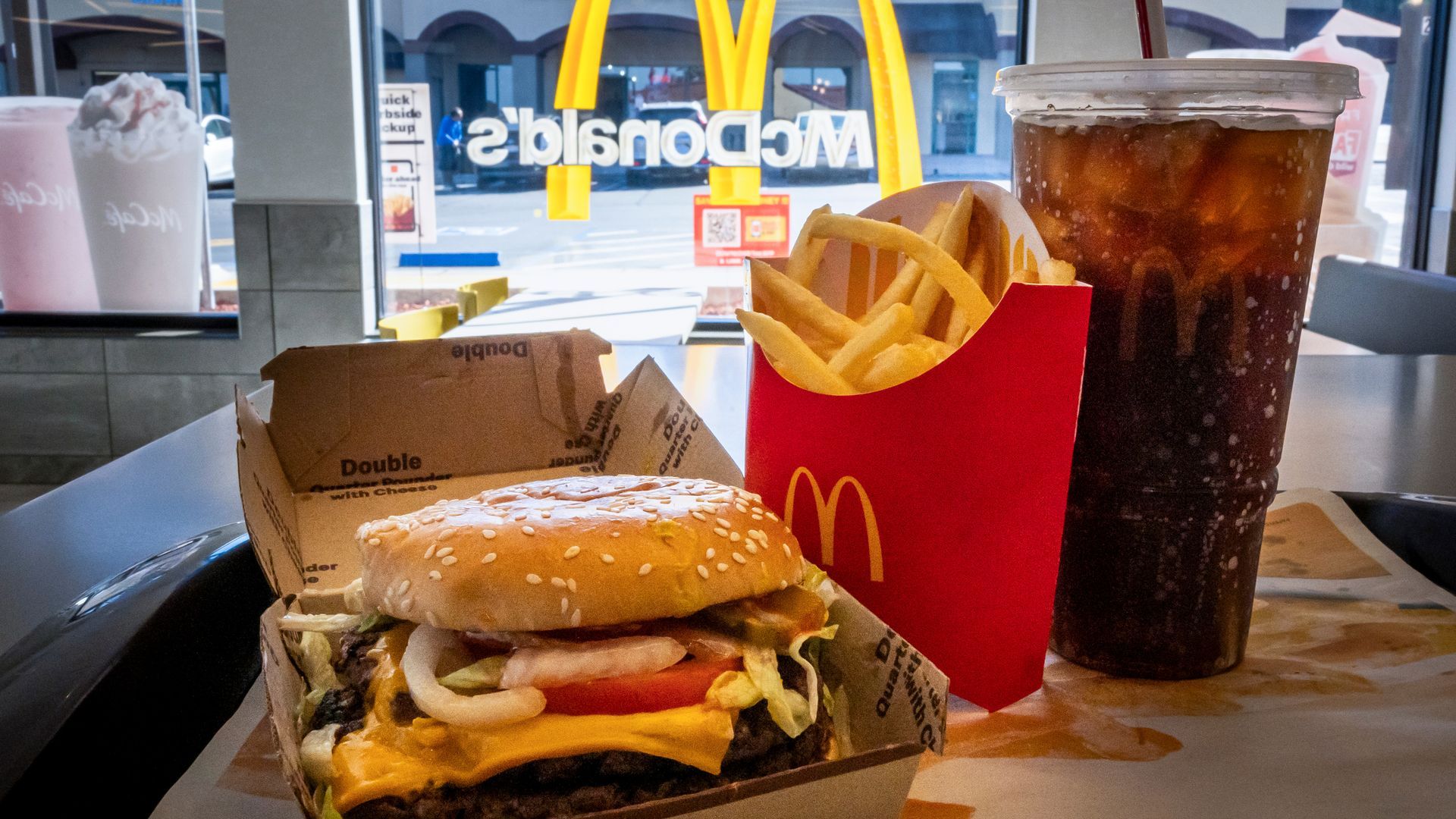 McDonald's meal in front of a McDonald's window