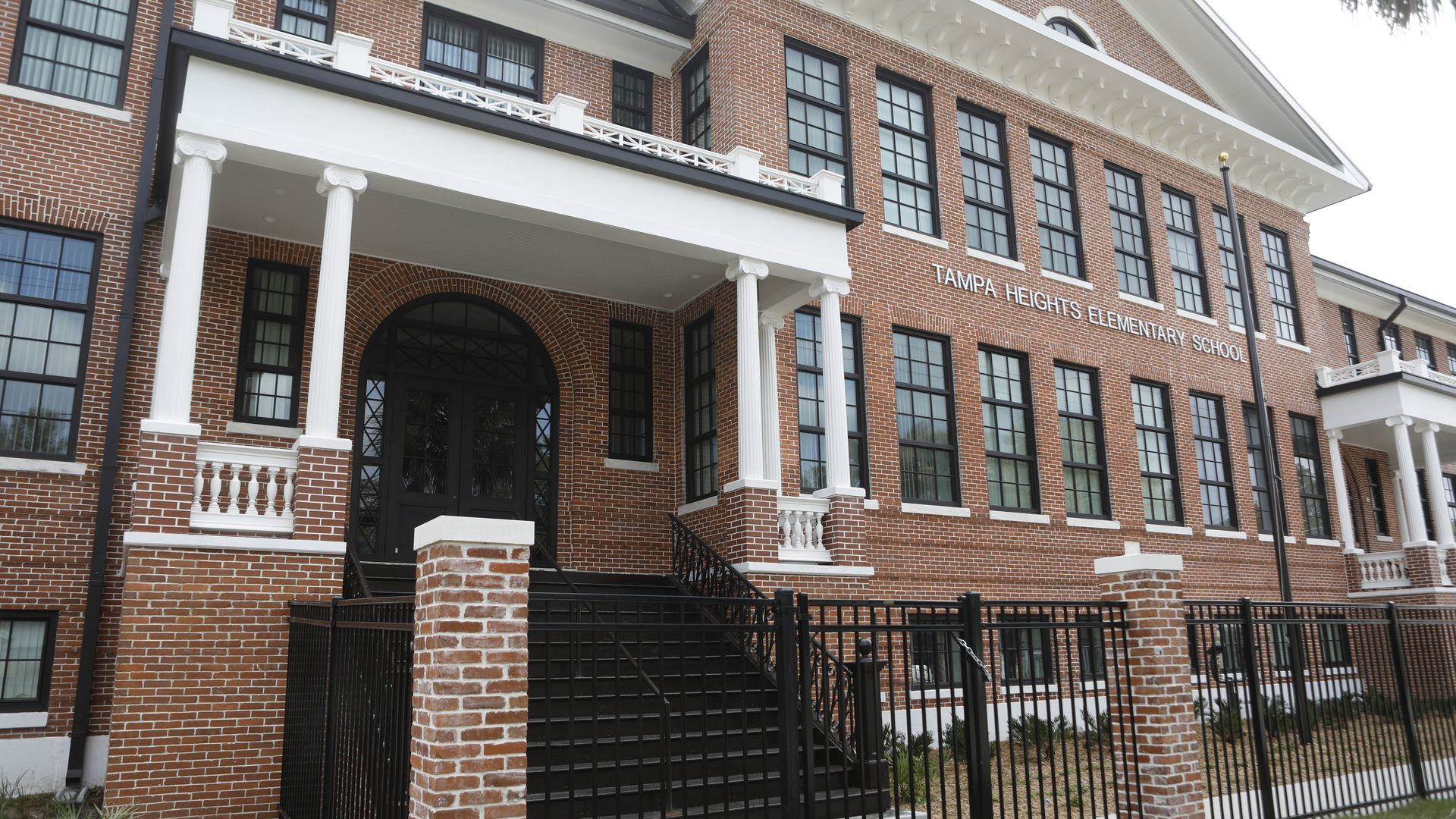 A photograph of the north-facing brick facade of Tampa Heights Elementary School in Tampa, Florida.