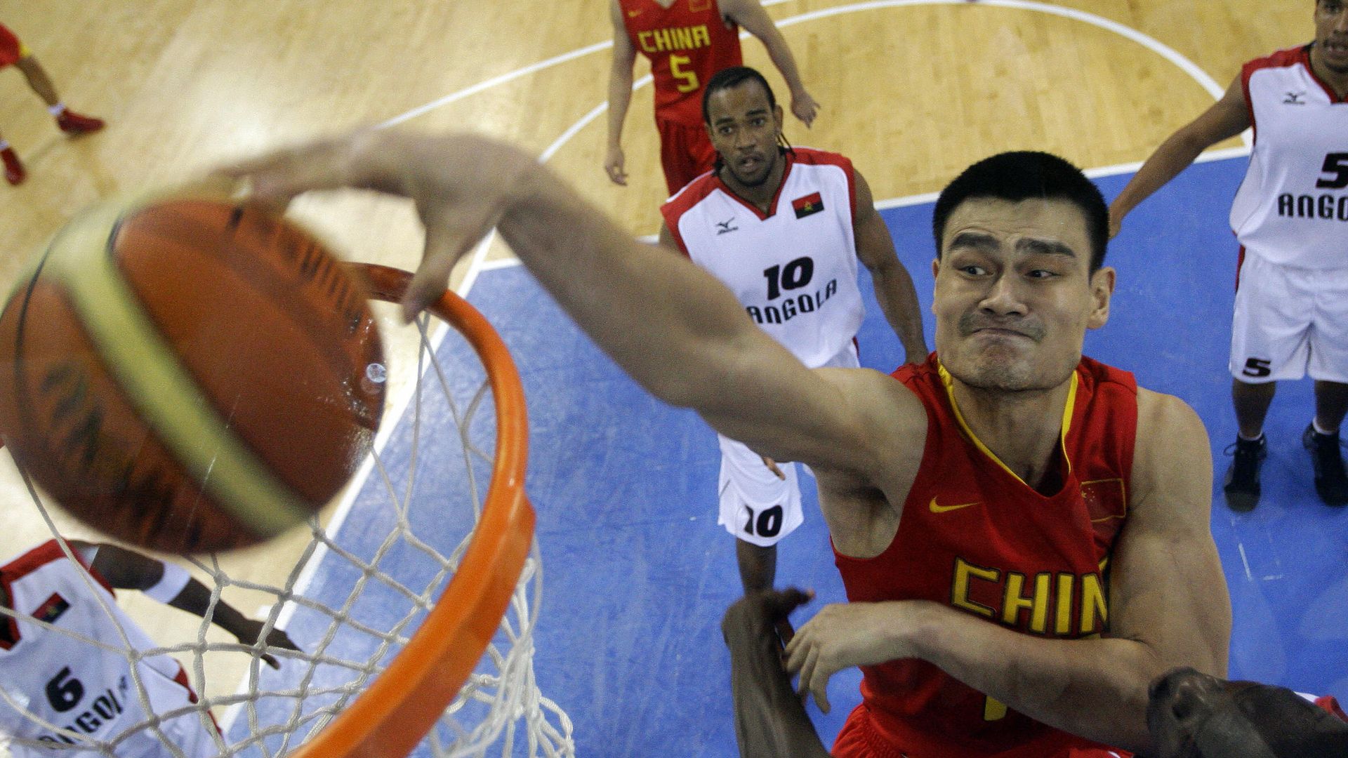 Photo of Chinese basketball player Yao Ming dunking