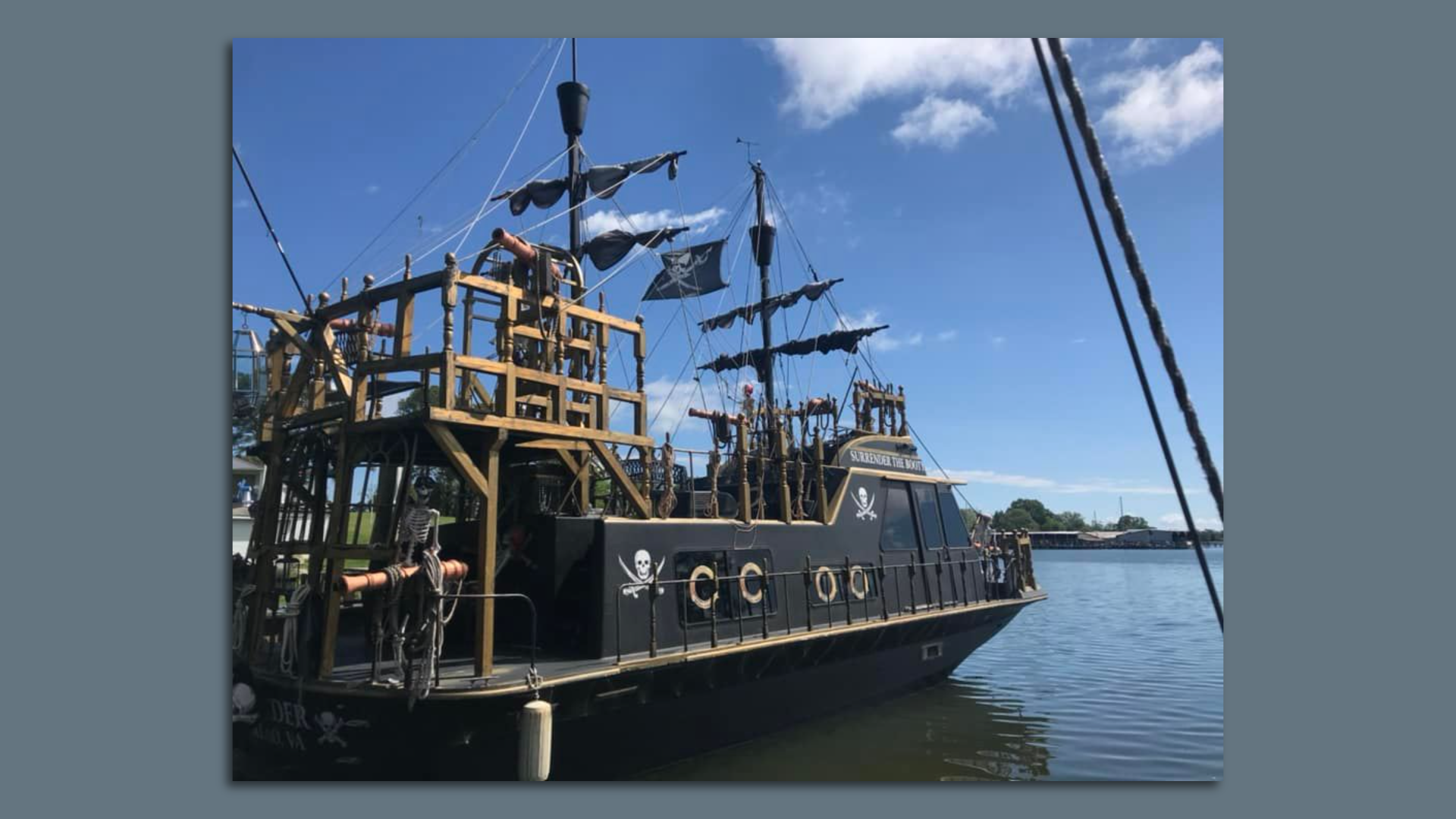 A houseboat that looks like pirate ship