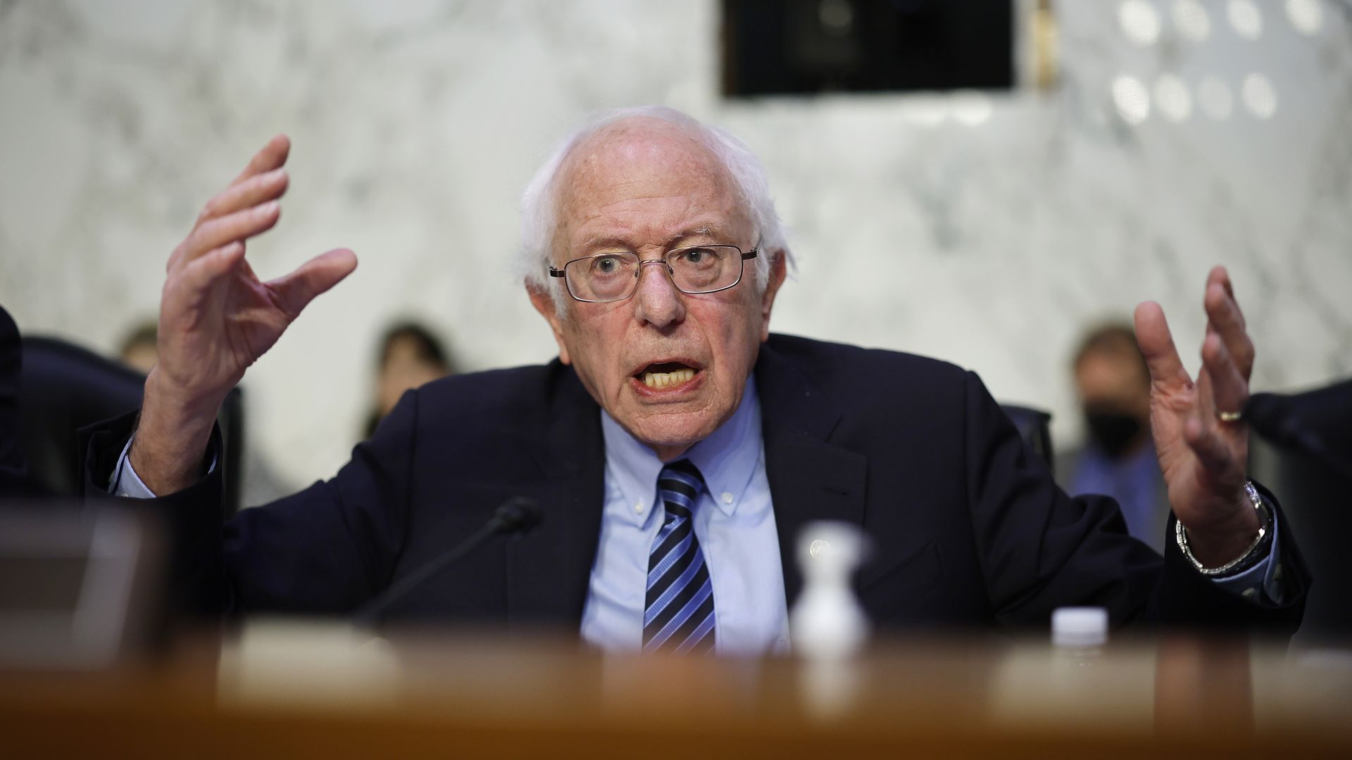 Senator Bernie Sanders gestures at a hearing