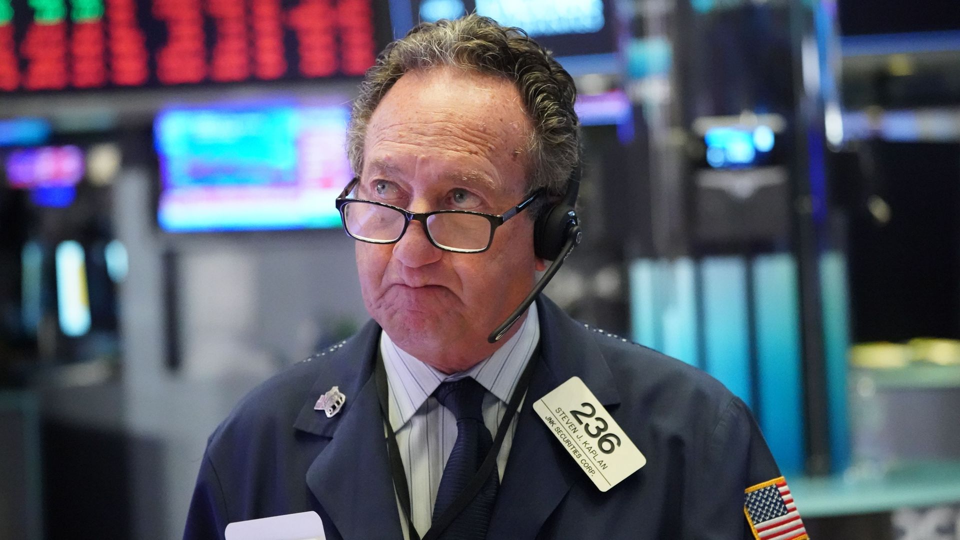 A stock trader at the New York Stock Exchange