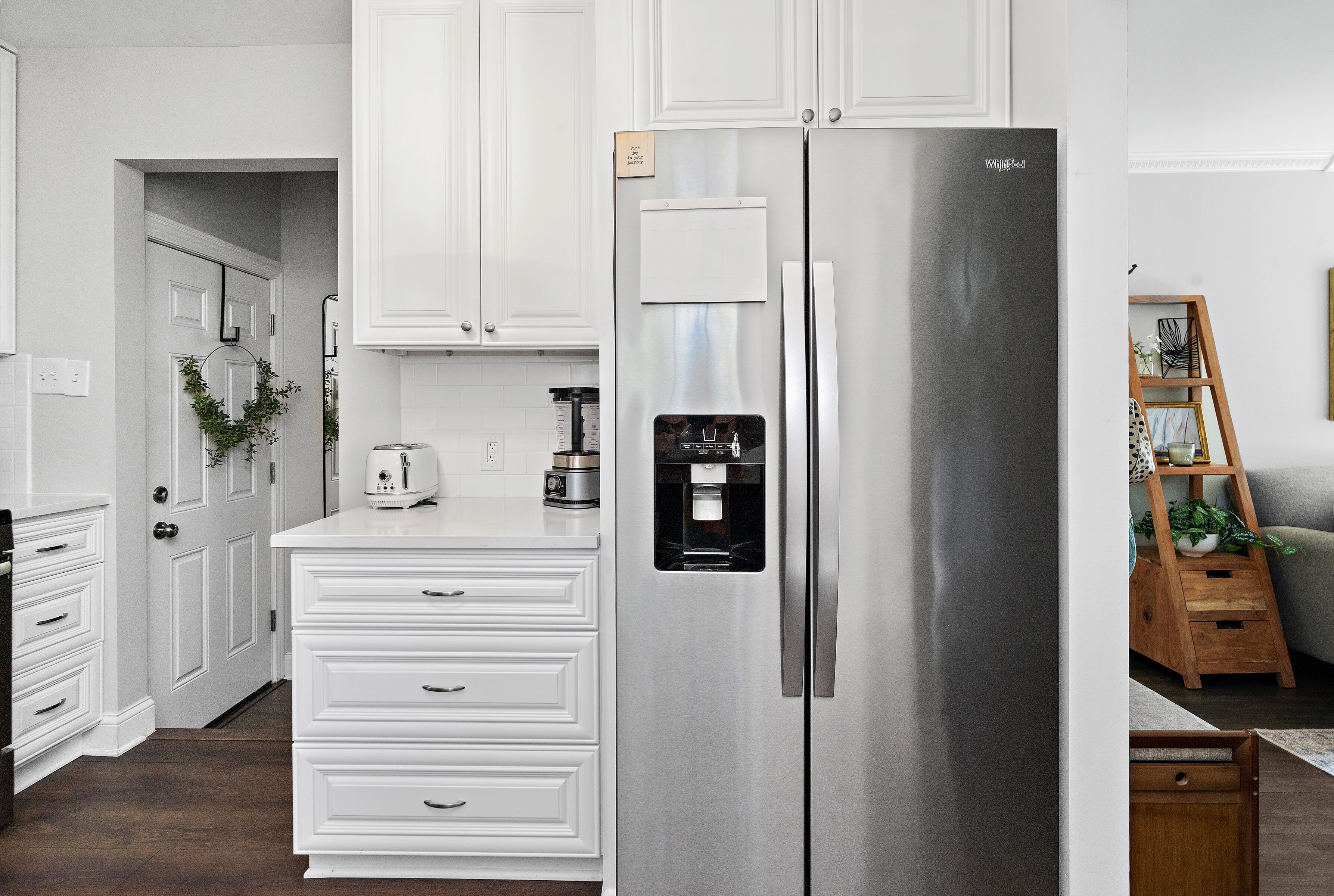 view of kitchen that opens to living room