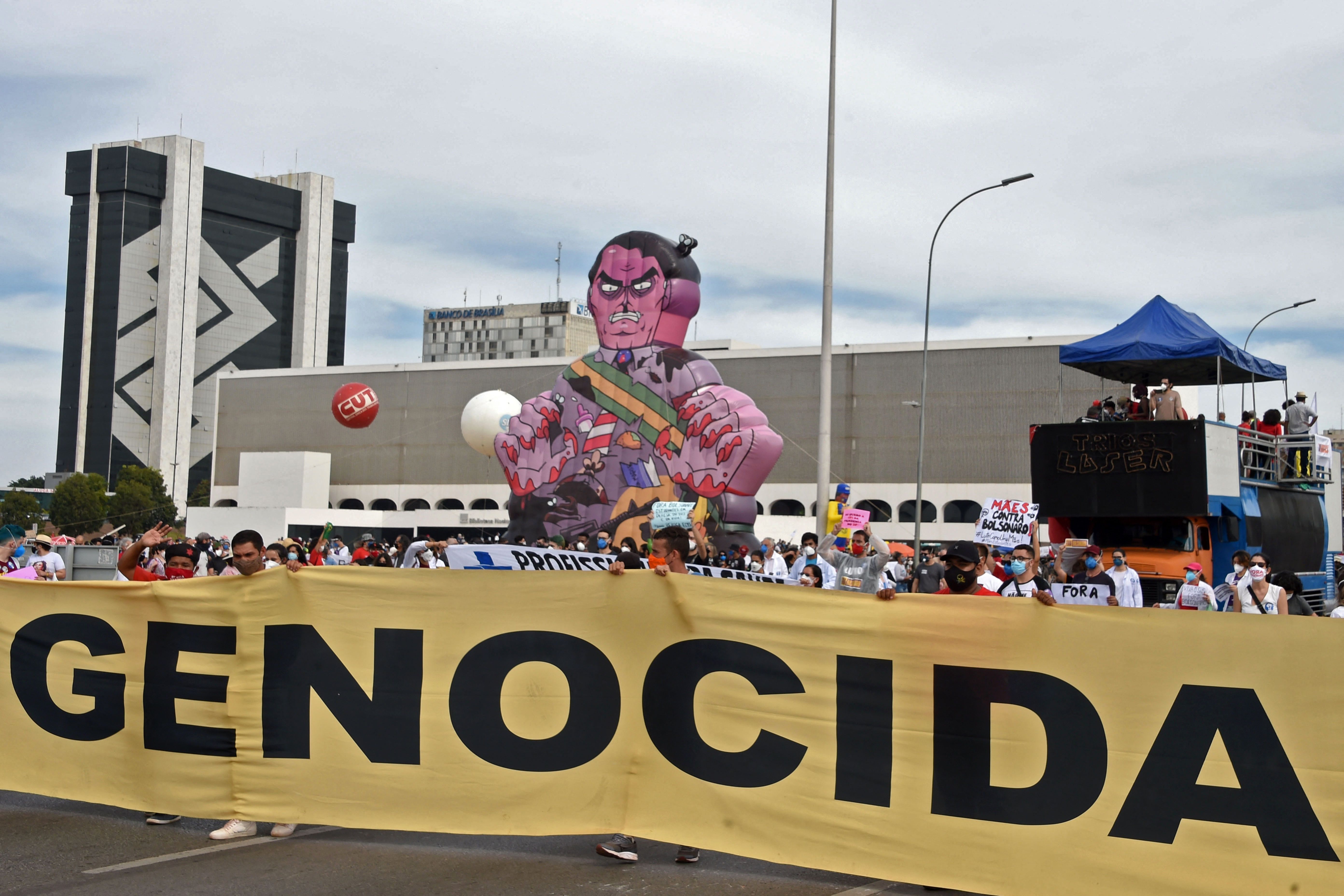 A protest against Brazilian President Jair Bolsonaro's handling of the COVID-19 pandemic with a giant inflatable doll depicting him as a monster, in Brasilia, on May 29
