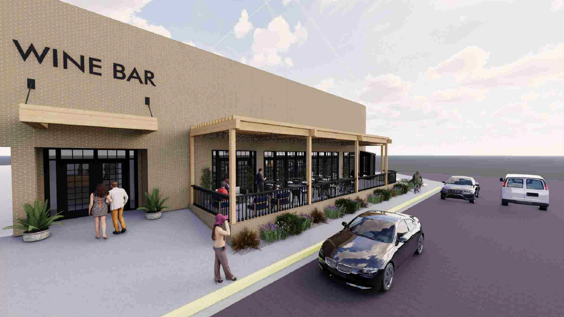 A brick store with wine bar written on it. A patio out front 