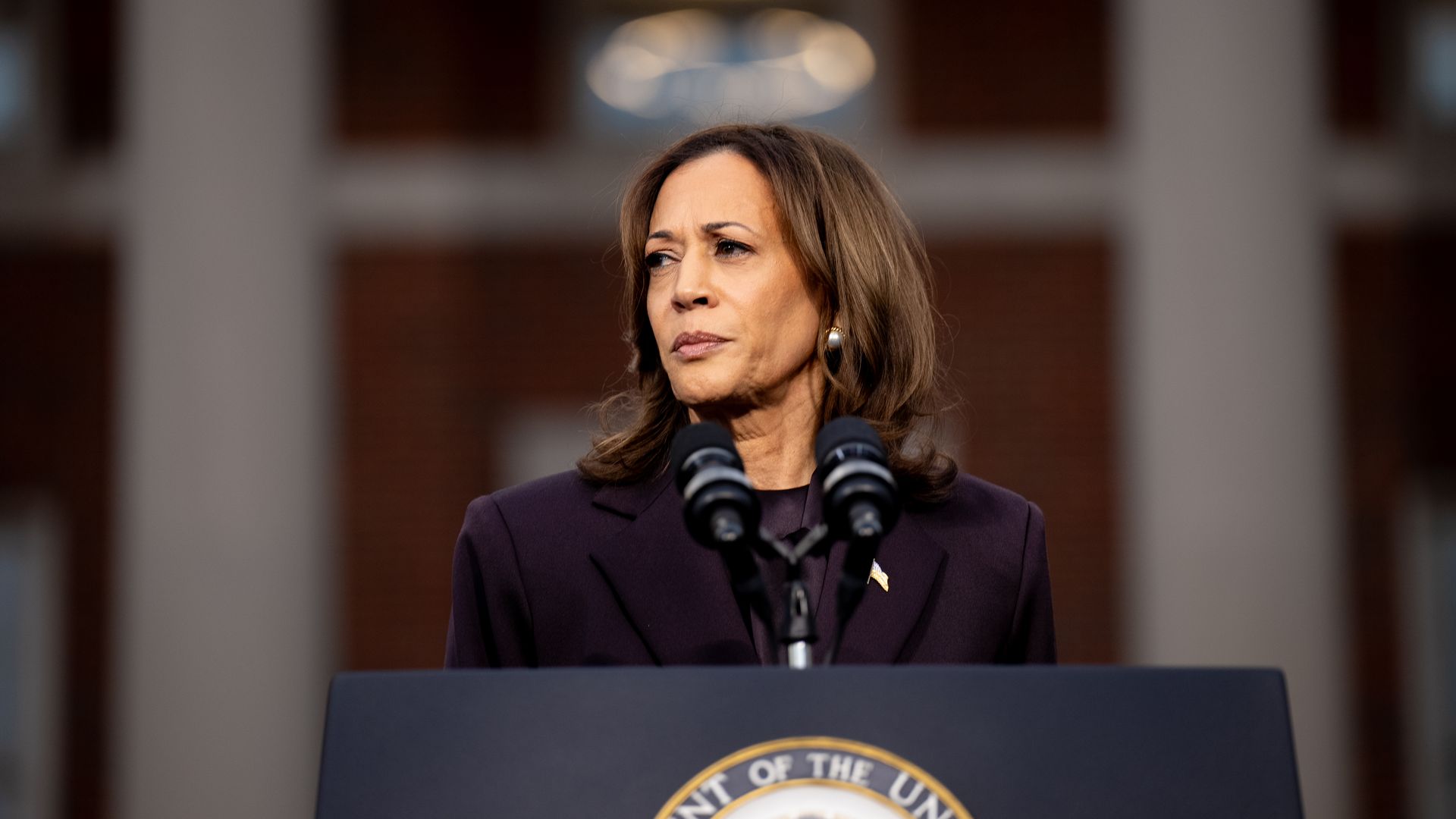 Kamala Harris pauses while speaking on stage as she concedes the election, at Howard University on November 06, 