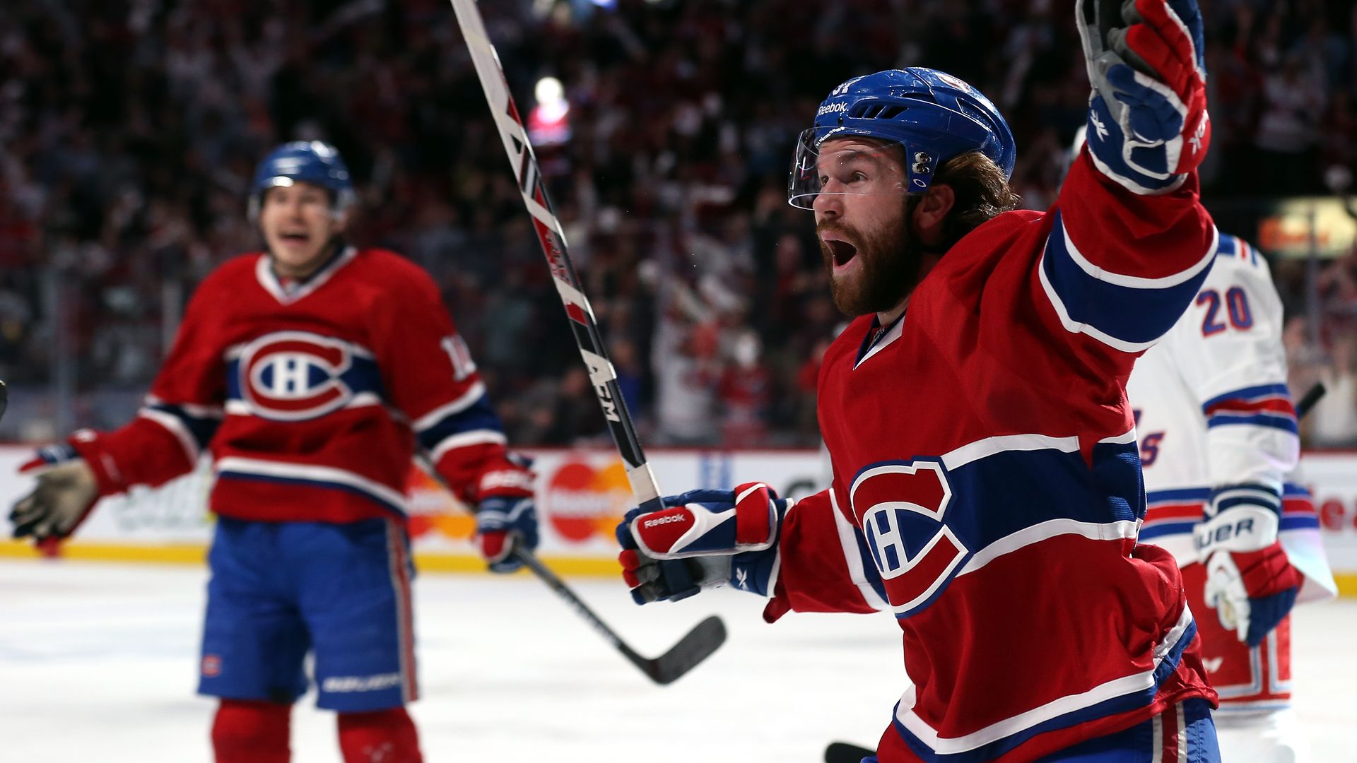 Photo of hockey players celebrating