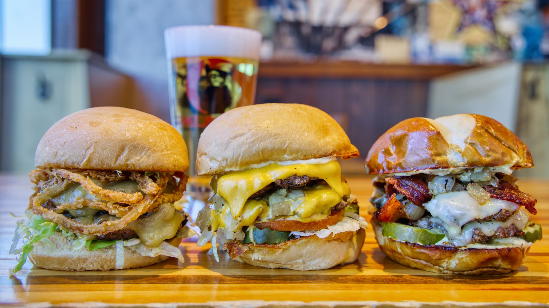 Three burgers in a line.