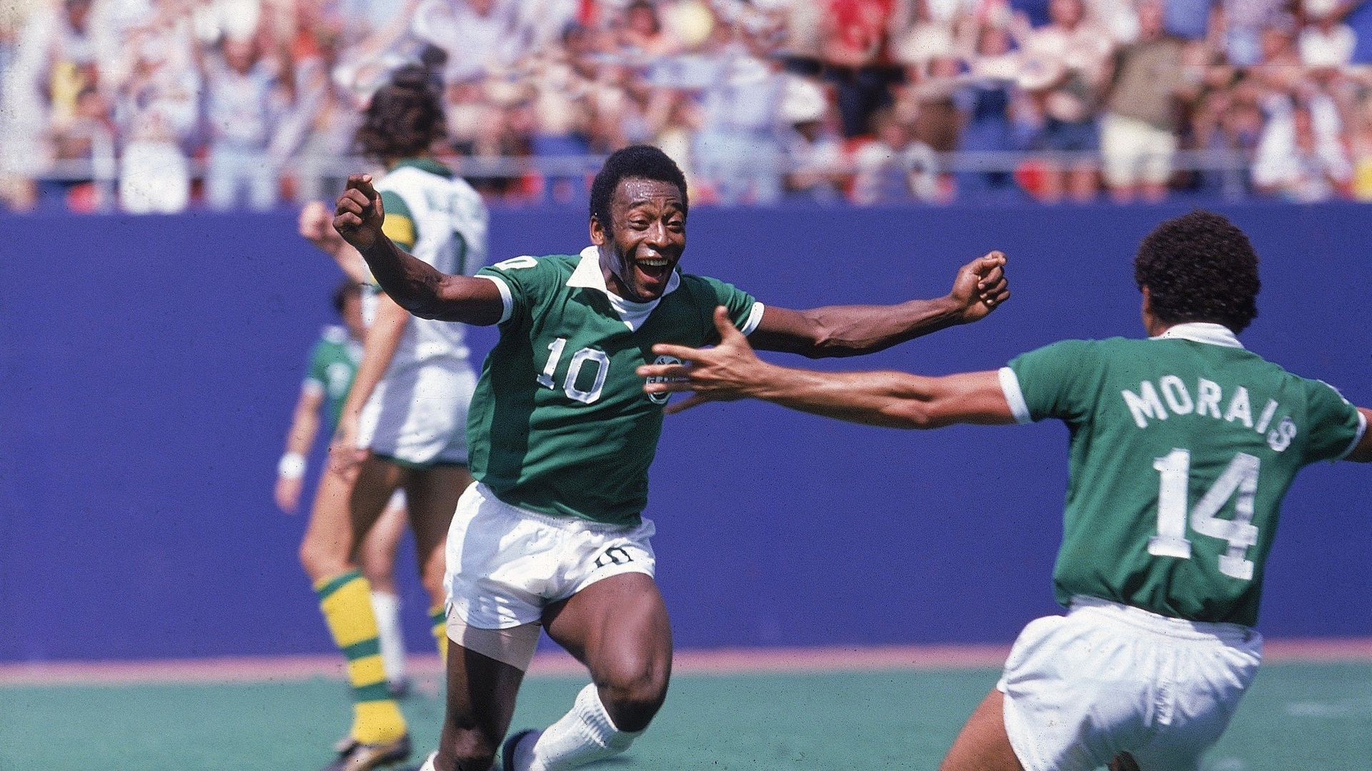 Pele celebrates after scoring a goal in soccer