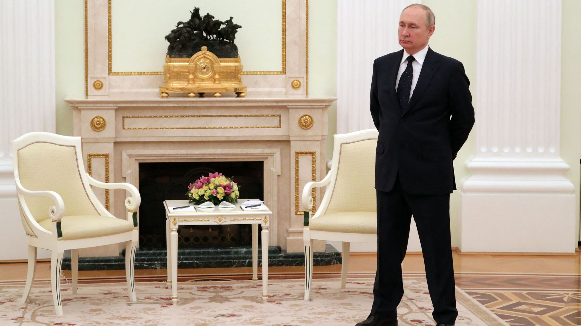 Russian President Vladimir Putin stands in a hall prior to a meeting with his Belarus' counterpart at the Kremlin in Moscow on March 11.