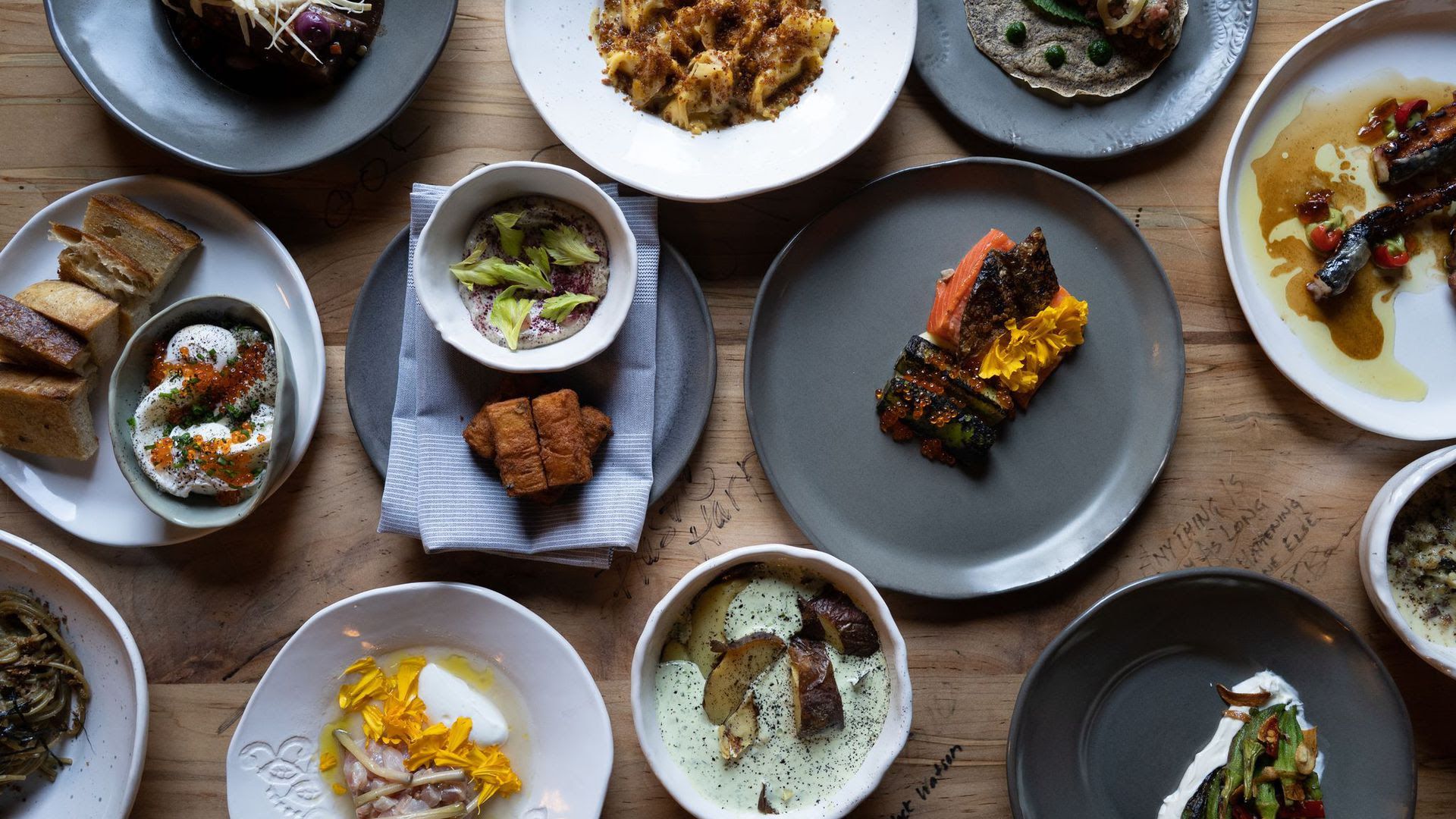 Food crowding a table at Saint Stephen. 