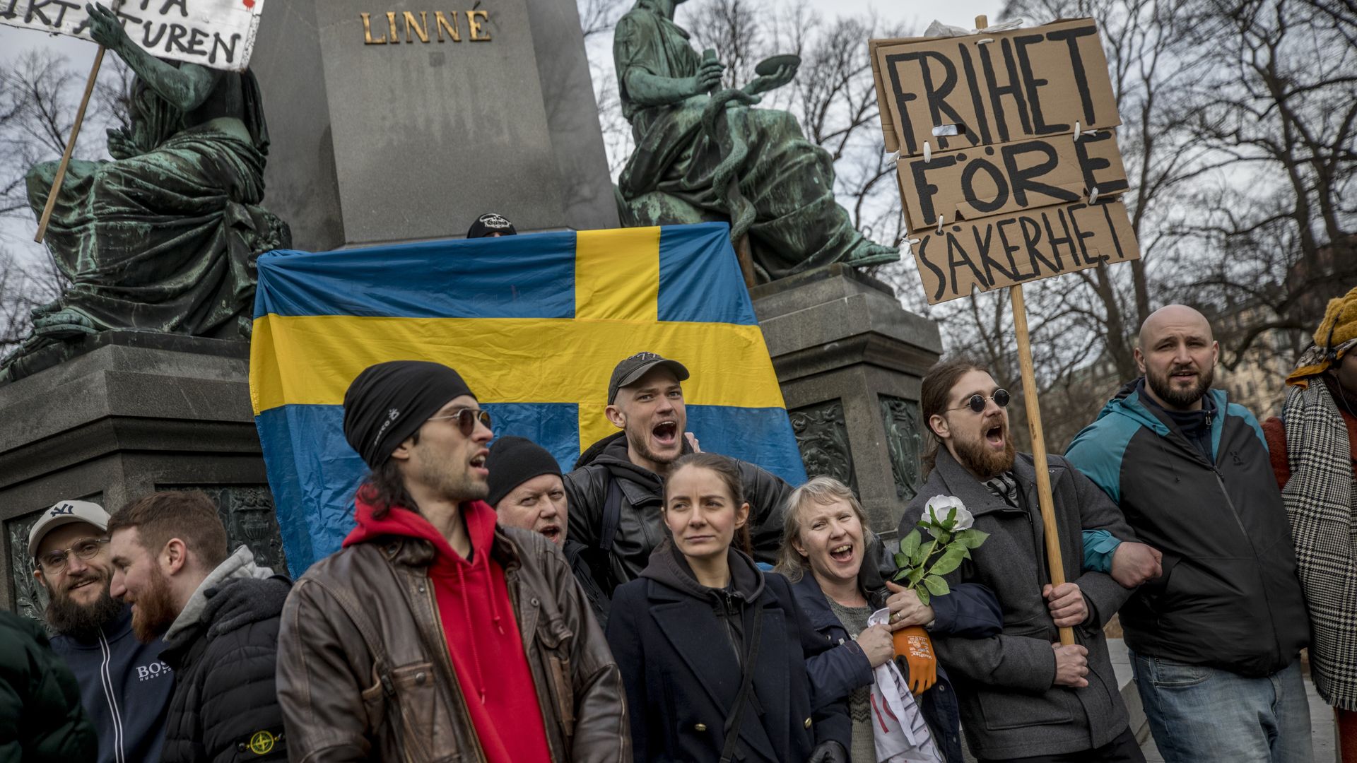 Protesters holding a demonstration against lockdowns in humlegård park in Stockholm.