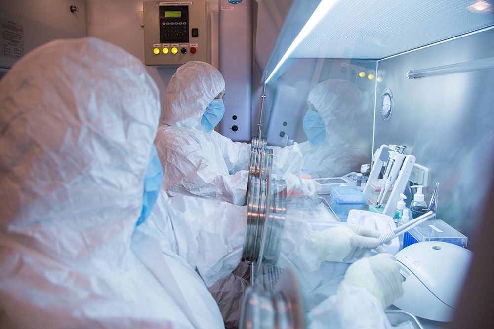 An undated photo released by the Irkutsk Anti-Plague Research Institute of Siberia and Far East shows the institute workers in a lab. 