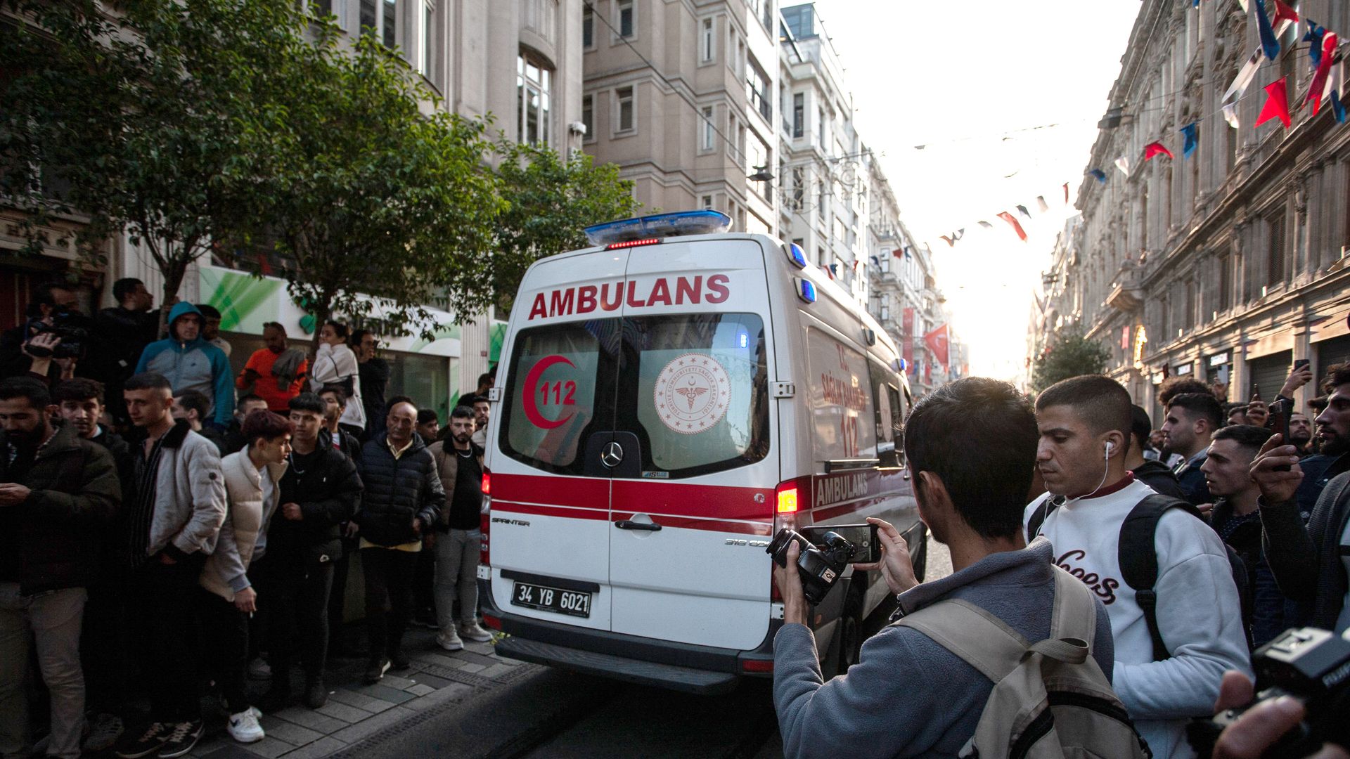 An ambulance leaves the blast site after an explosion on busy pedestrian Istiklal street on November 13, 2022 in Istanbul, Turkey