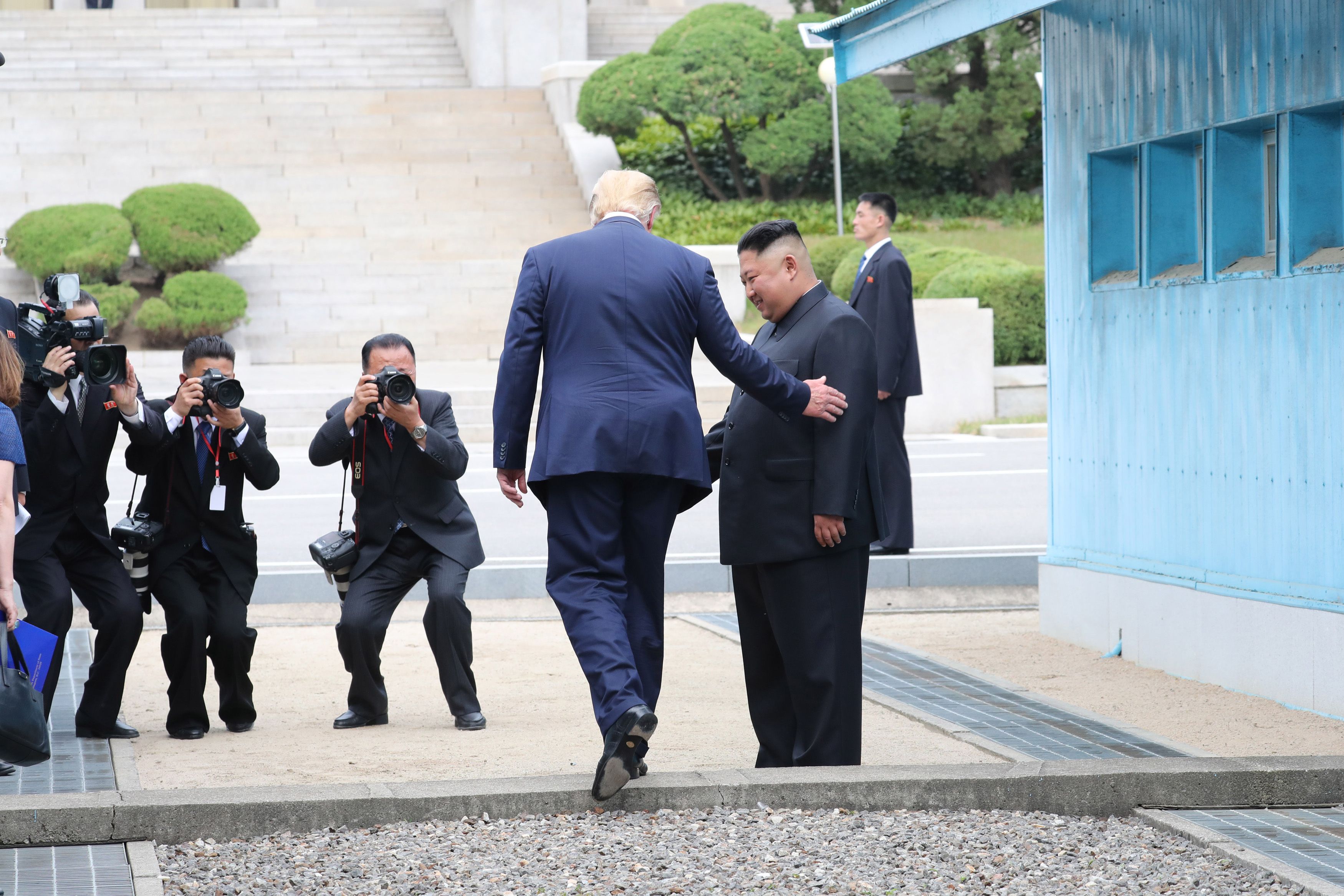  A handout photo provided by Dong-A Ilbo of North Korean leader Kim Jong Un and U.S. President Donald Trump inside the demilitarized zone (DMZ) separating the South and North Korea.